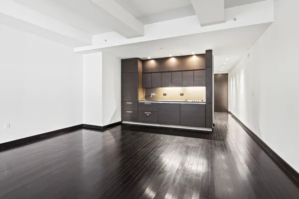 a view of kitchen with wooden floor