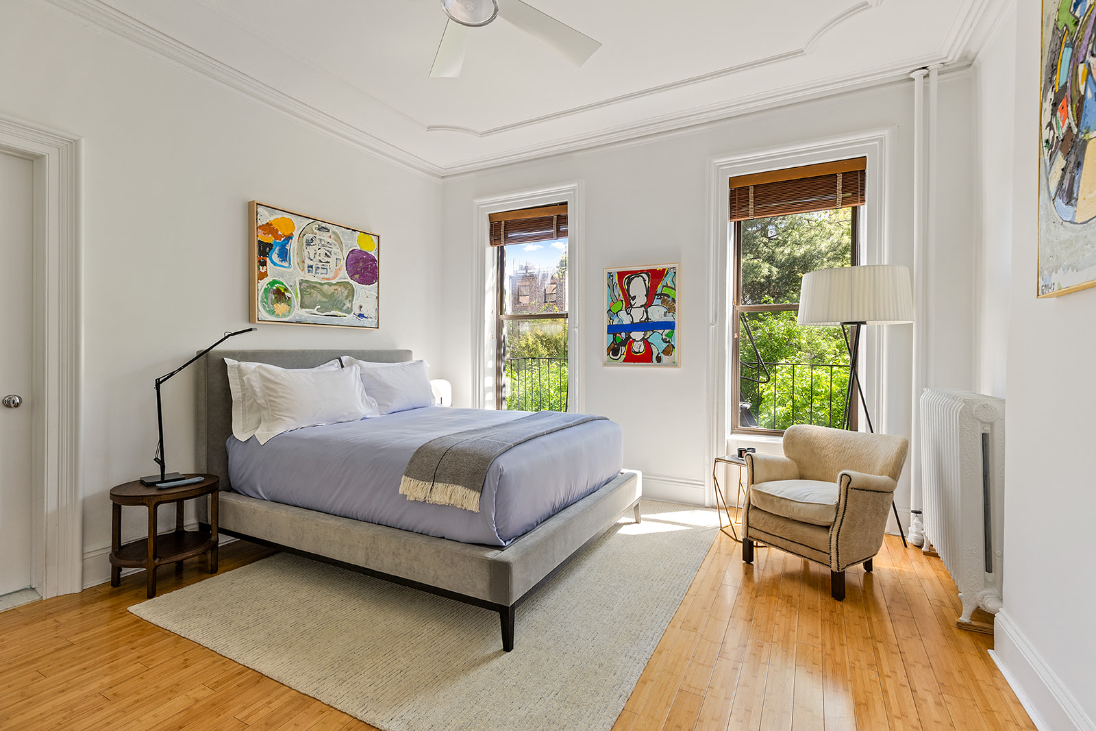 315 Adelphi Street, Unit 2 Brooklyn, NY 11205 - Photo 3 of 12 a bedroom with a bed and wooden floor