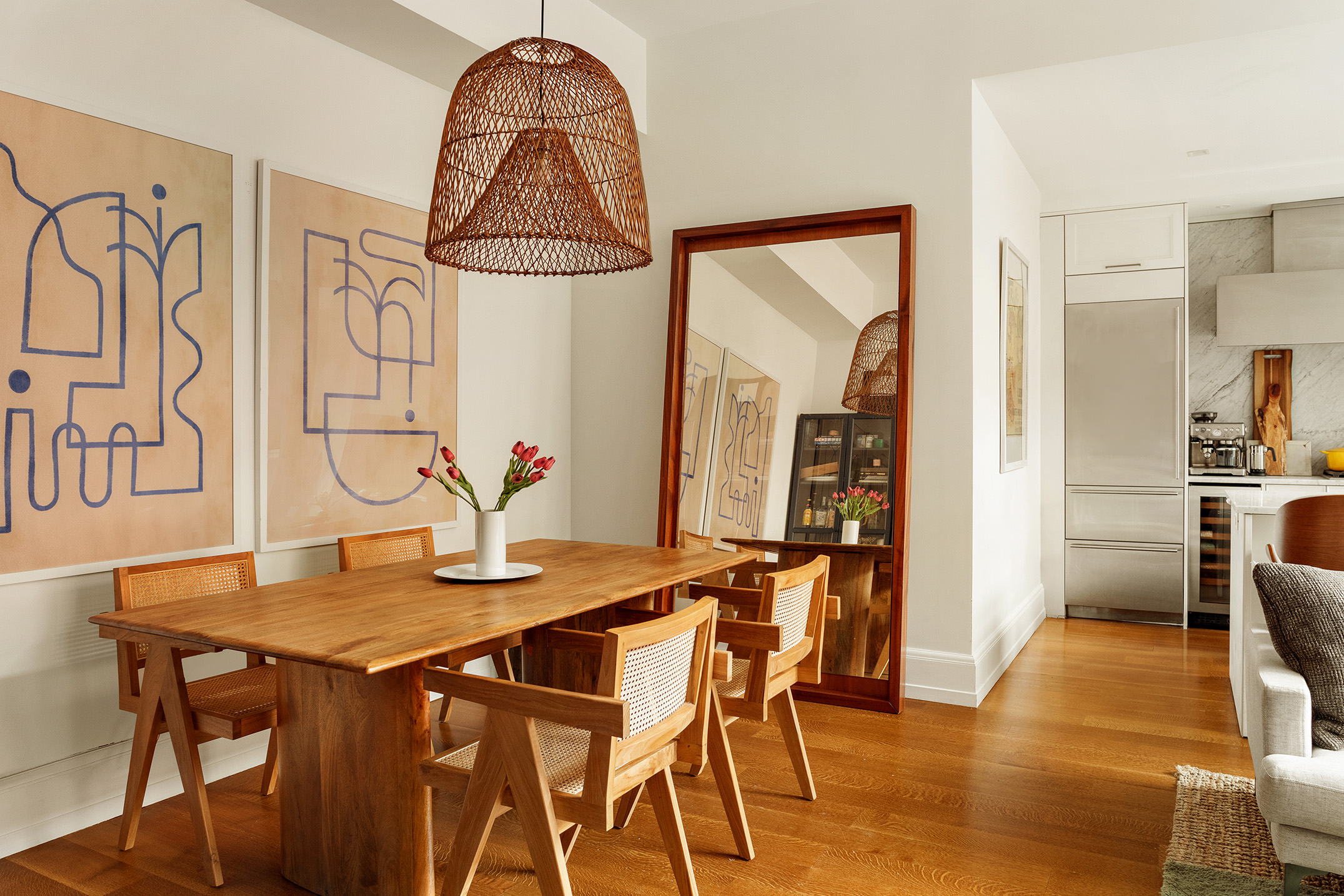 10 Madison Square West, Unit 9G Manhattan, NY 10010 - Photo 3 of 13 a view of a dining room with furniture and wooden floor