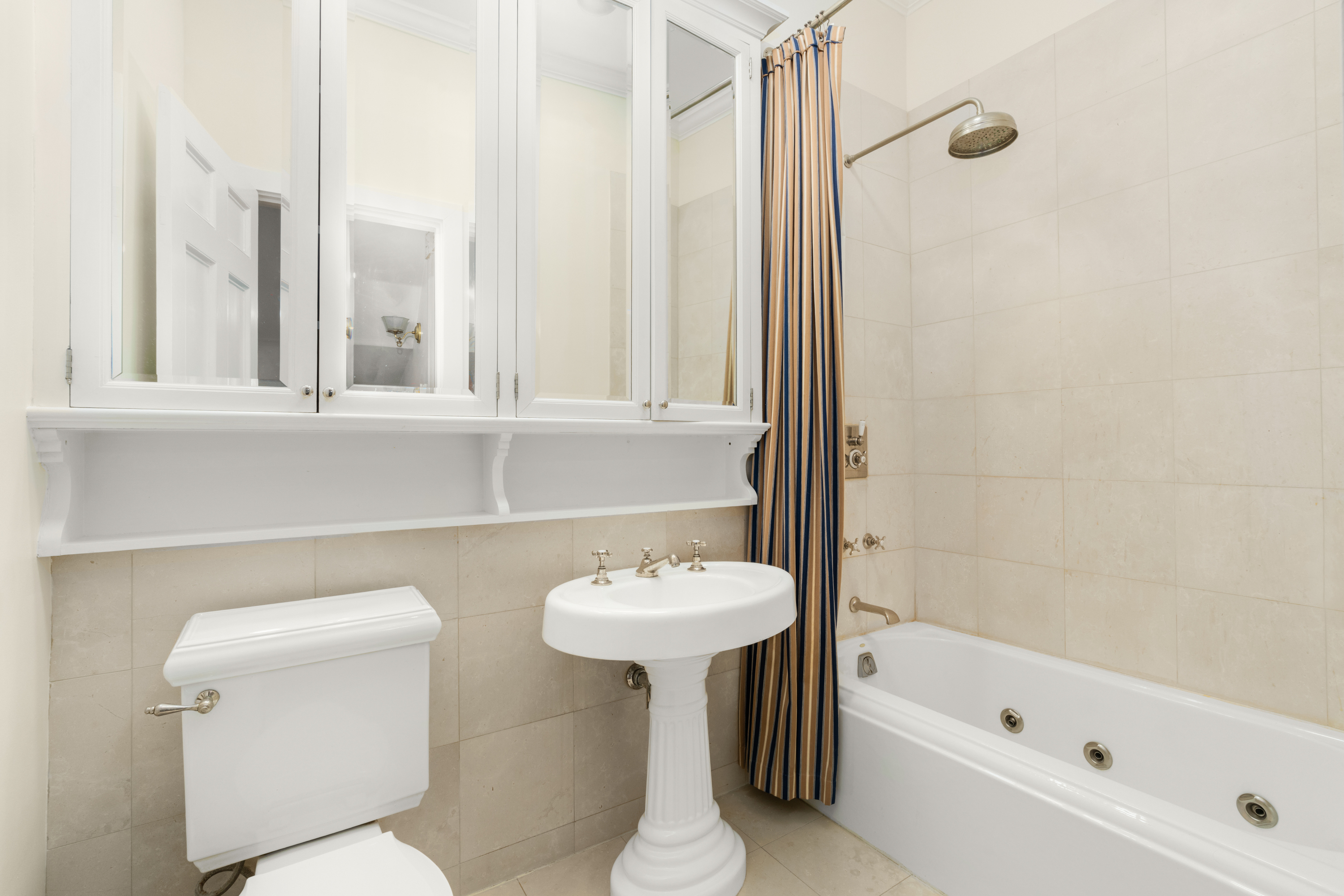 60 Hicks Street Brooklyn, NY 11201 - Photo 7 of 22 a bathroom with a sink a toilet and a bathtub