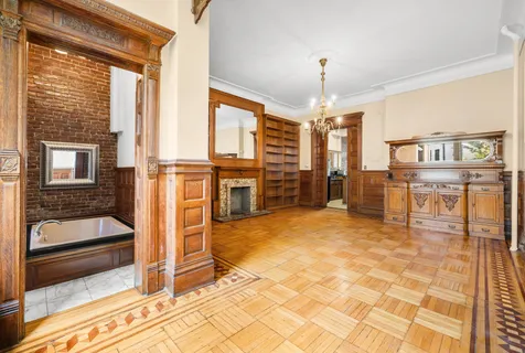 a view of livingroom with kitchen view and furniture