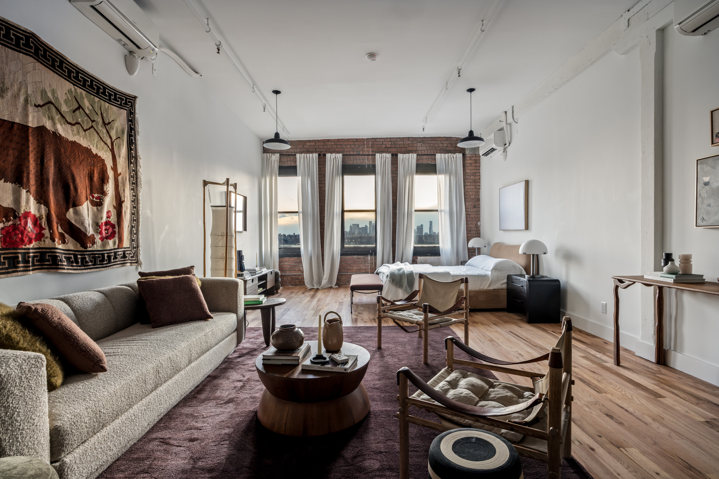 239 Banker Street, Unit 2R Brooklyn, NY 11222 - Photo 6 of 13 a living room with furniture and a floor to ceiling window