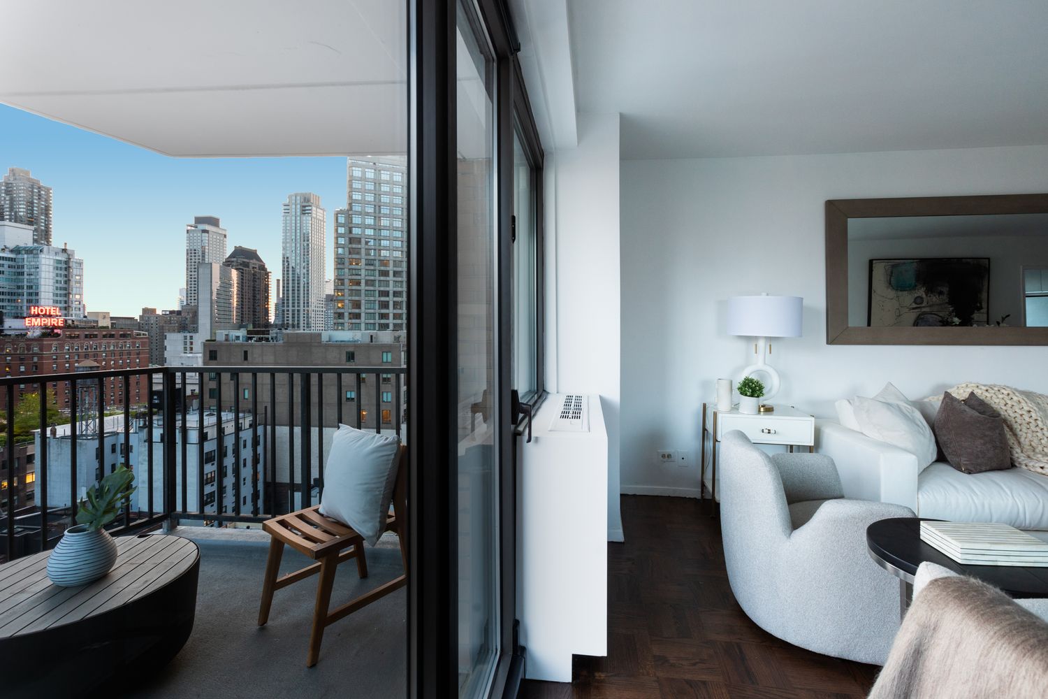 a living room with furniture and a window