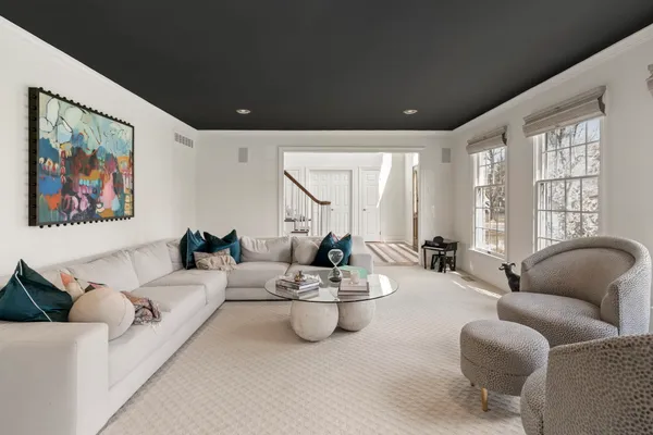 a kitchen with stainless steel appliances granite countertop a refrigerator and a stove