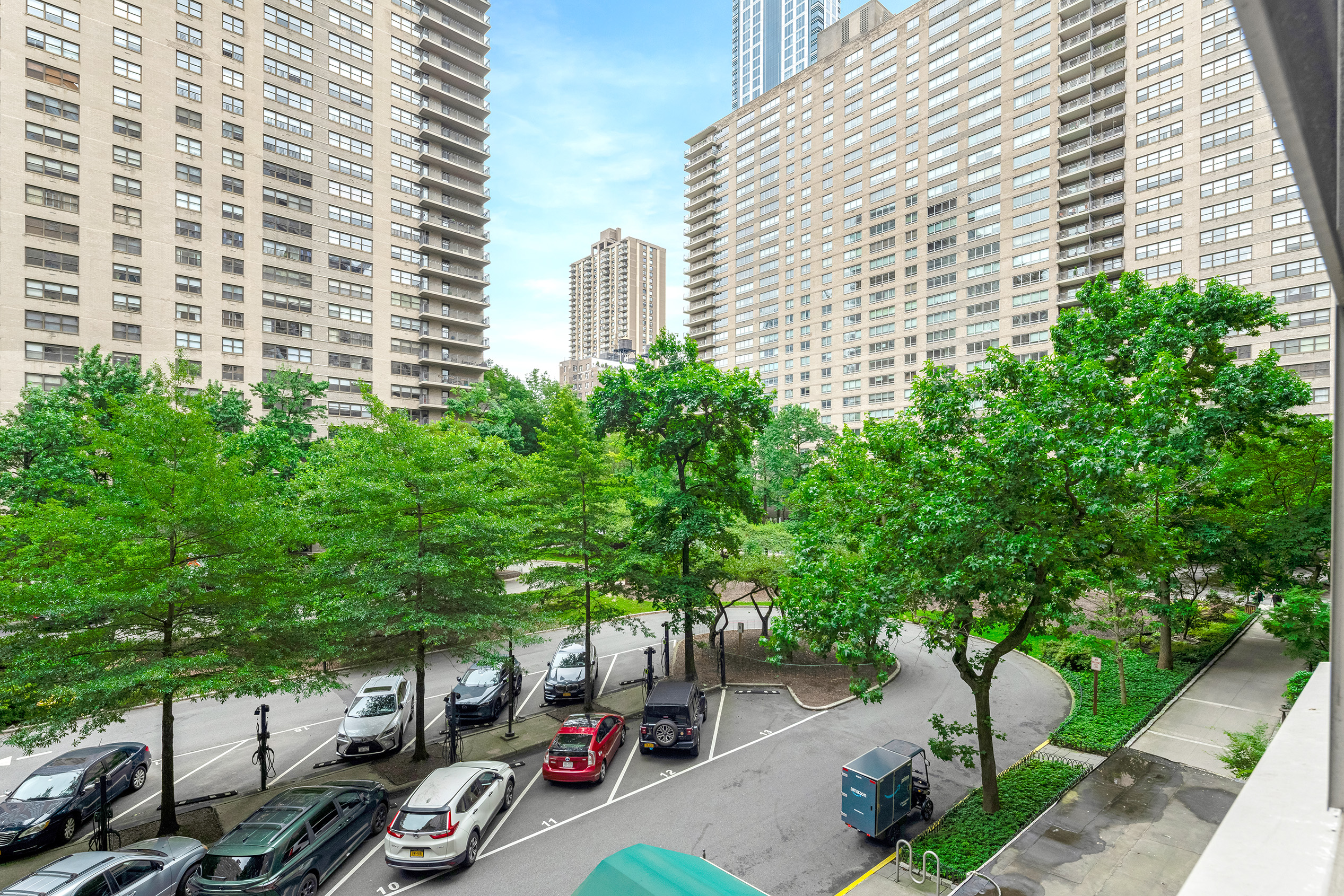 150 West End Avenue, Unit 3G Manhattan, NY 10023 - Photo 8 of 13 a couple of cars parked in front of a house