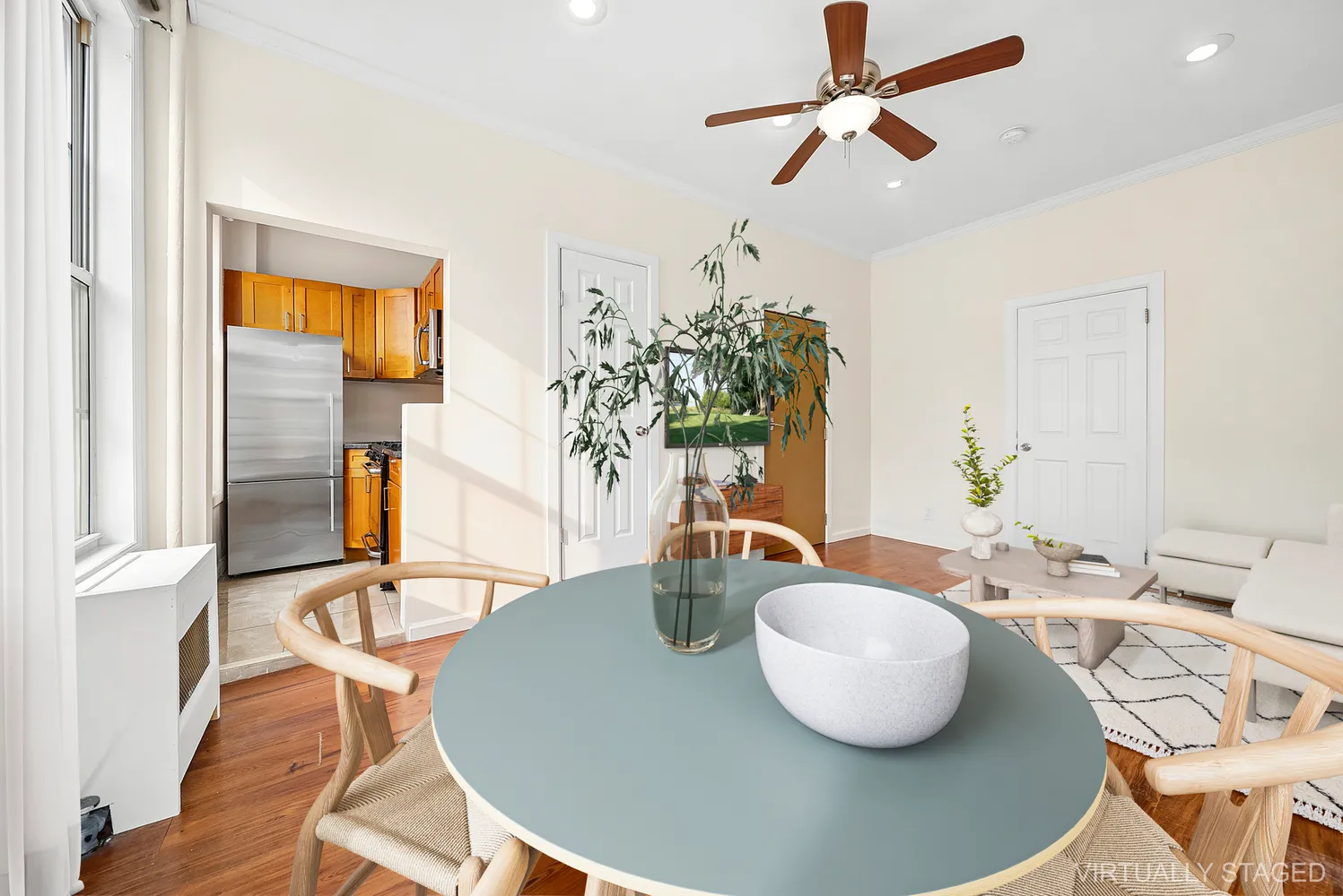a dining room with table and chairs