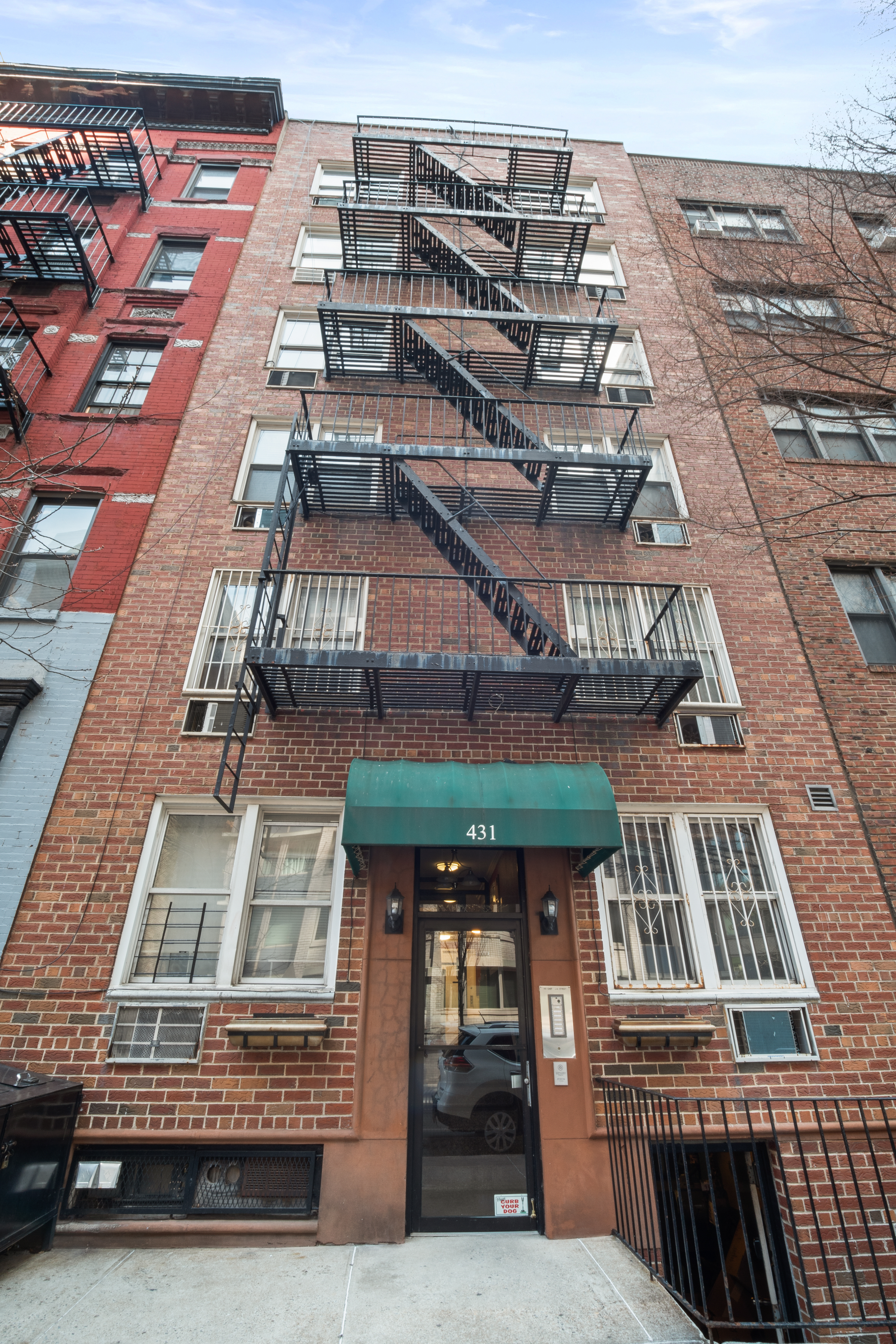 431 East 82nd Street, Unit 1A Manhattan, NY 10028 - Photo 8 of 9 a view of a building with many windows