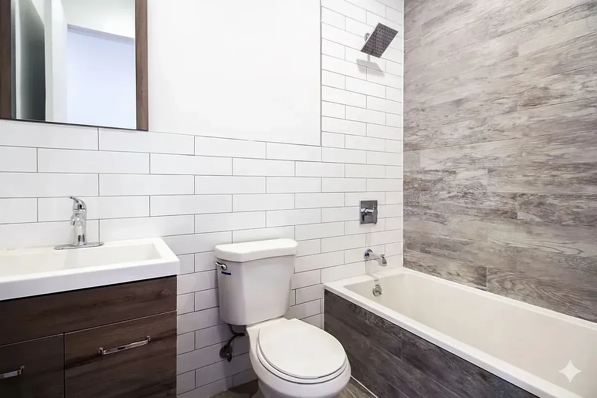a bathroom with a sink a toilet and bathtub