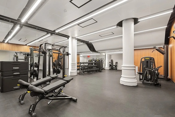 666 Greenwich Street, Unit 350 Manhattan, NY 10014 - Photo 9 of 13 a view of a room with gym equipment