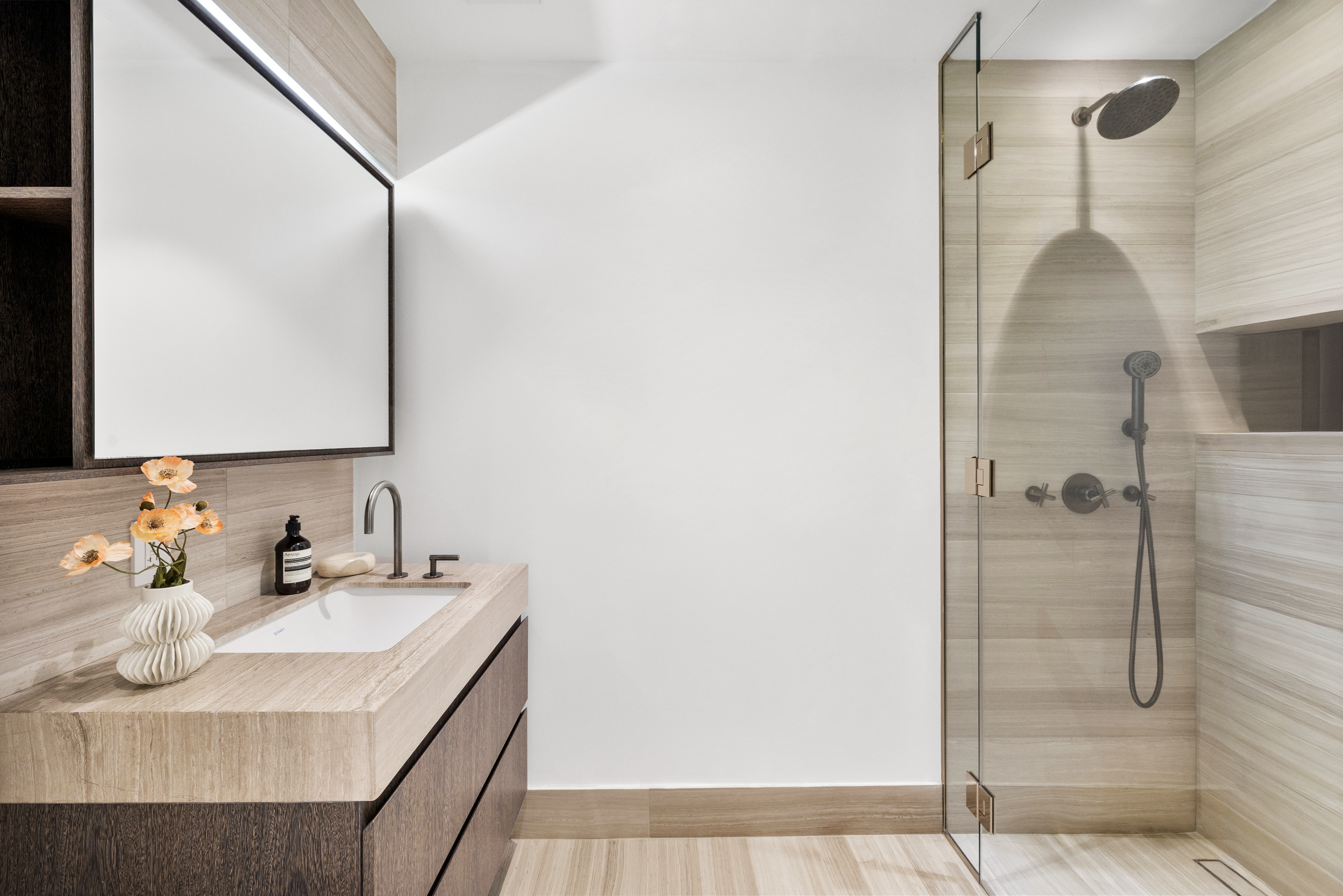 225 14th Street, Unit GARDEN A Brooklyn, NY 11215 - Photo 10 of 13 a bathroom with a sink and a mirror