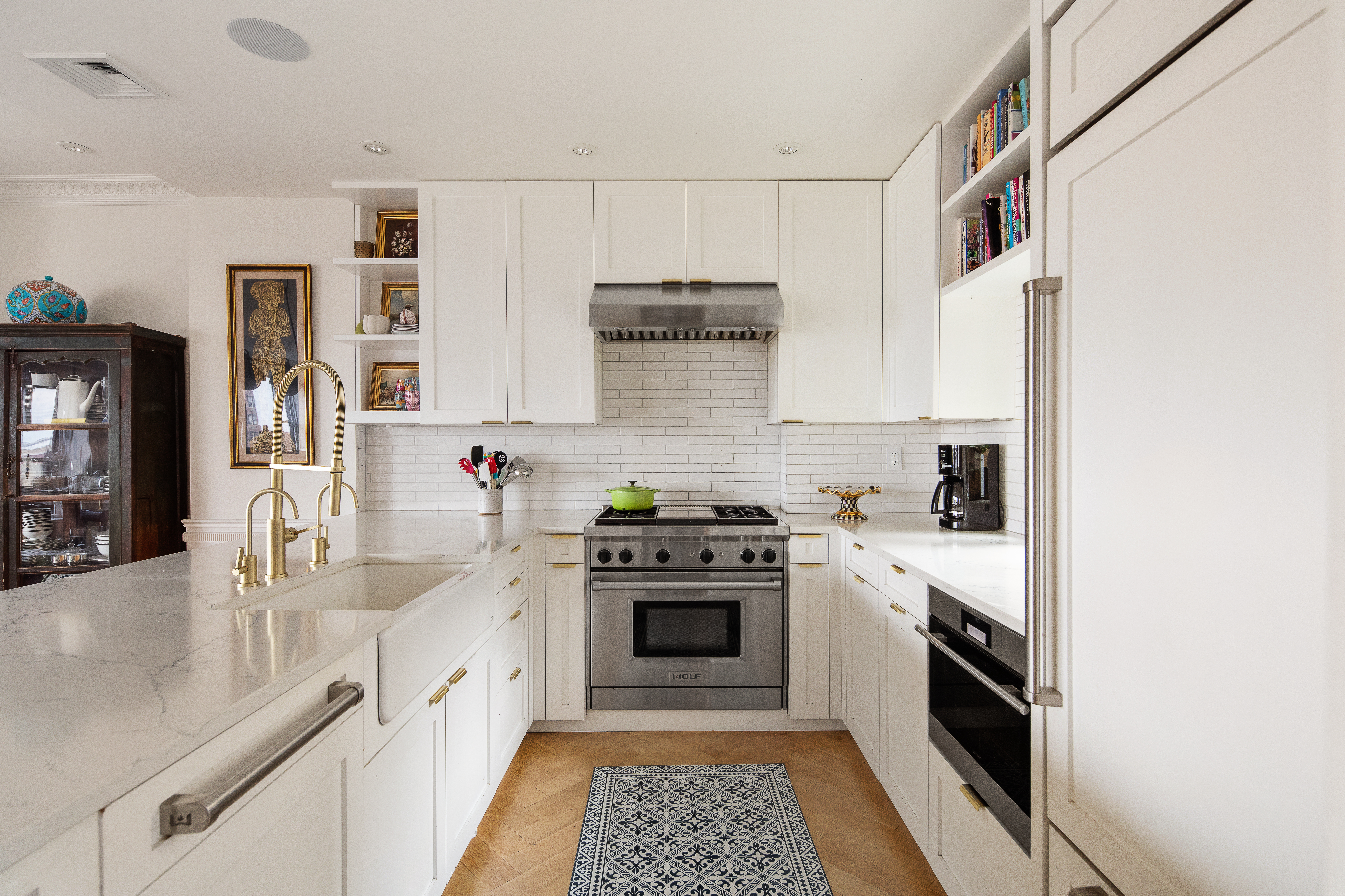 309 West 86th Street, Unit PH Manhattan, NY 10024 - Photo 6 of 16 a kitchen with stainless steel appliances granite countertop a stove and a sink
