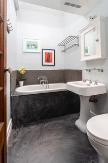 a bathroom with a sink and a toilet