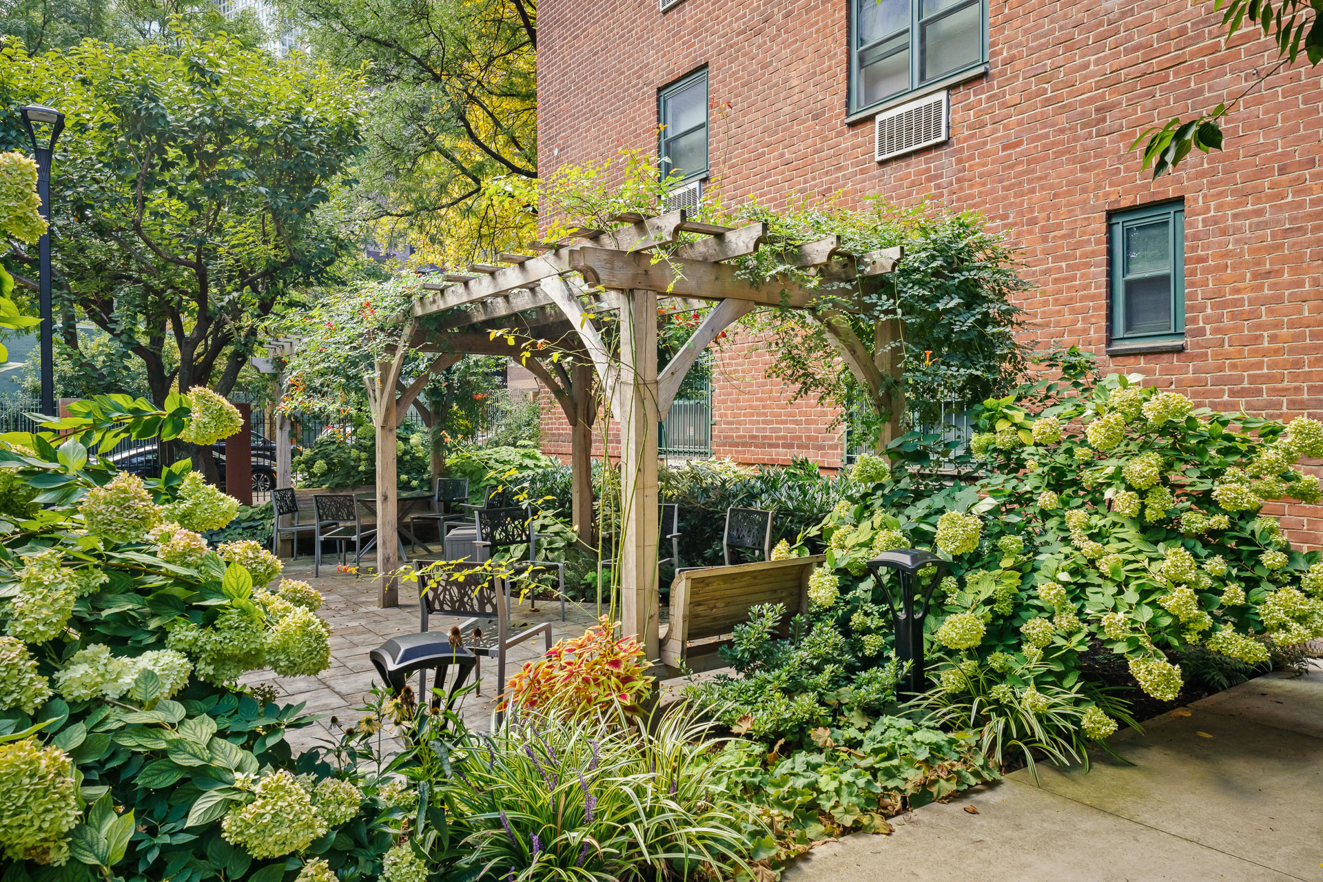 191 Willoughby Street, Unit 6N Brooklyn, NY 11201 - Photo 13 of 17 a view of a garden with plants