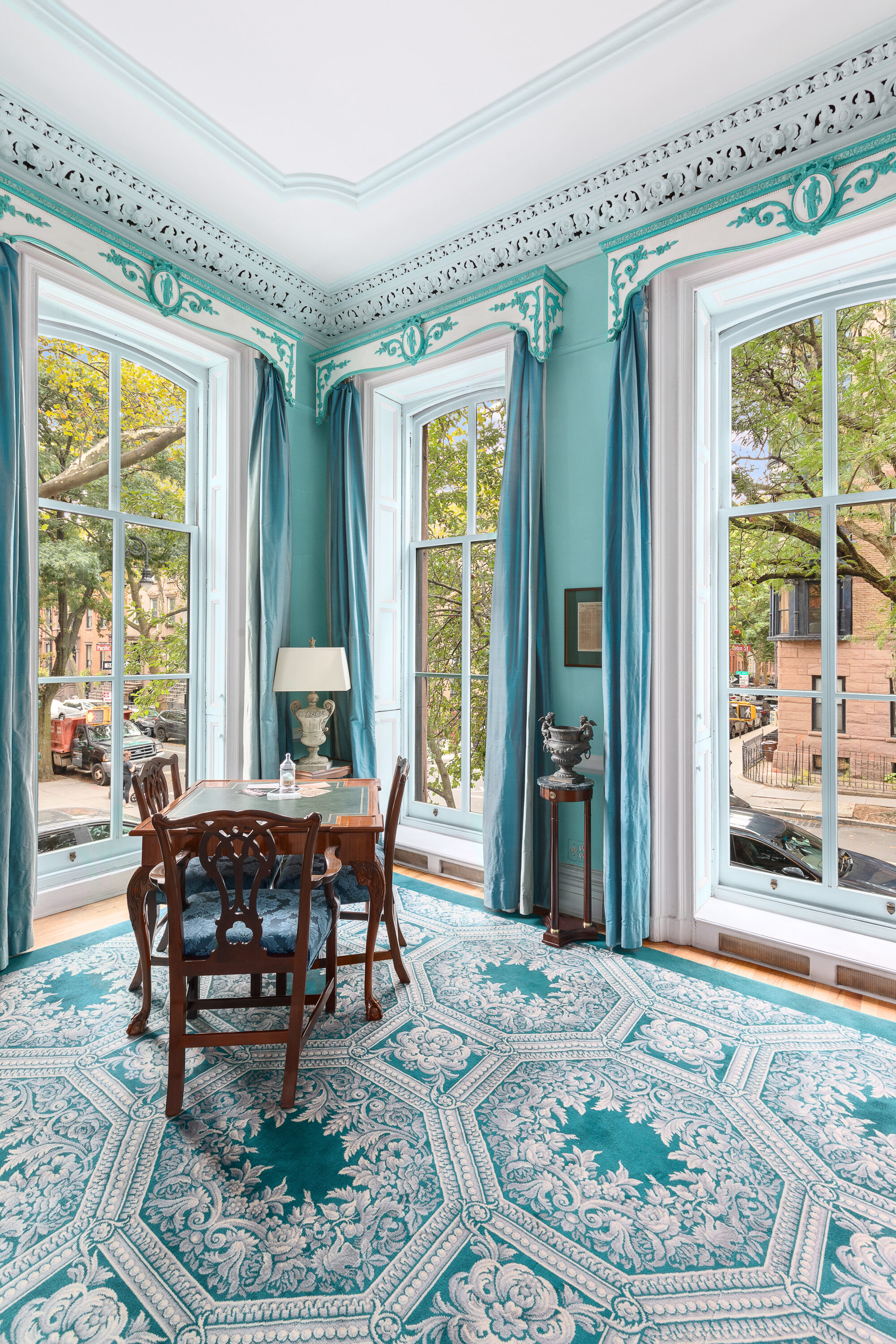 199 Clinton Street, Unit 2 Brooklyn, NY 11201 - Photo 11 of 17 a dining room with wooden floor and a rug