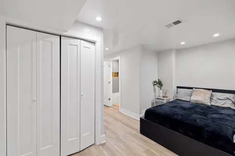 a view of entryway with wooden floor