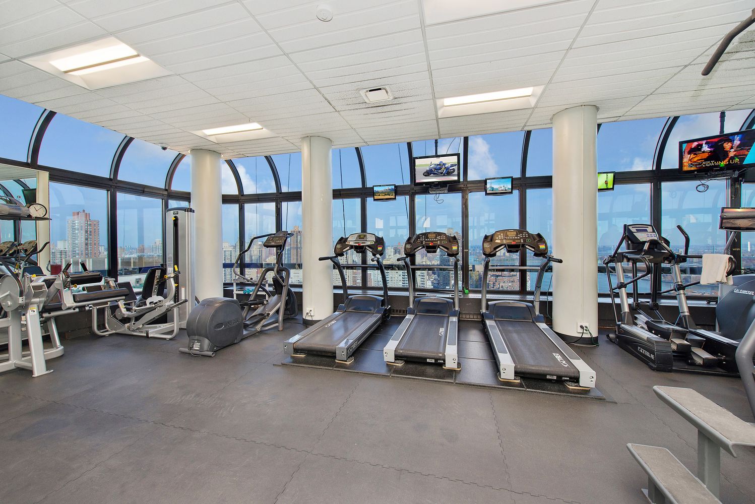 530 East 76th Street, Unit 10H Manhattan, NY 10021 - Photo 22 of 26 a view of a room with gym equipment