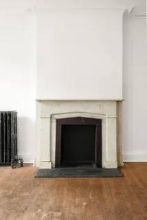 a living room with a fireplace