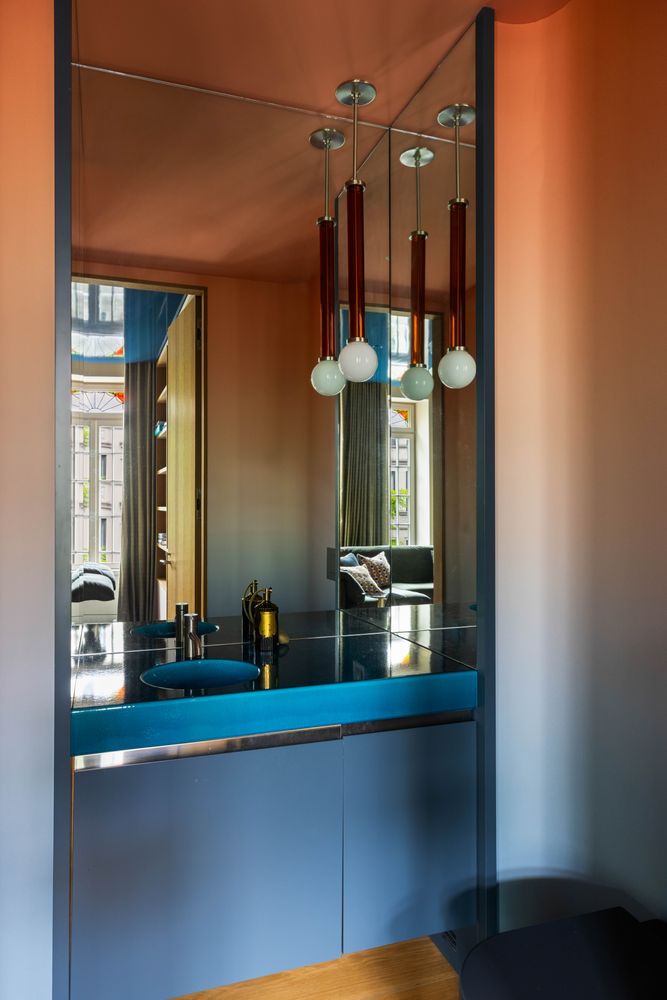 a room with lots of wooden furniture and cabinets