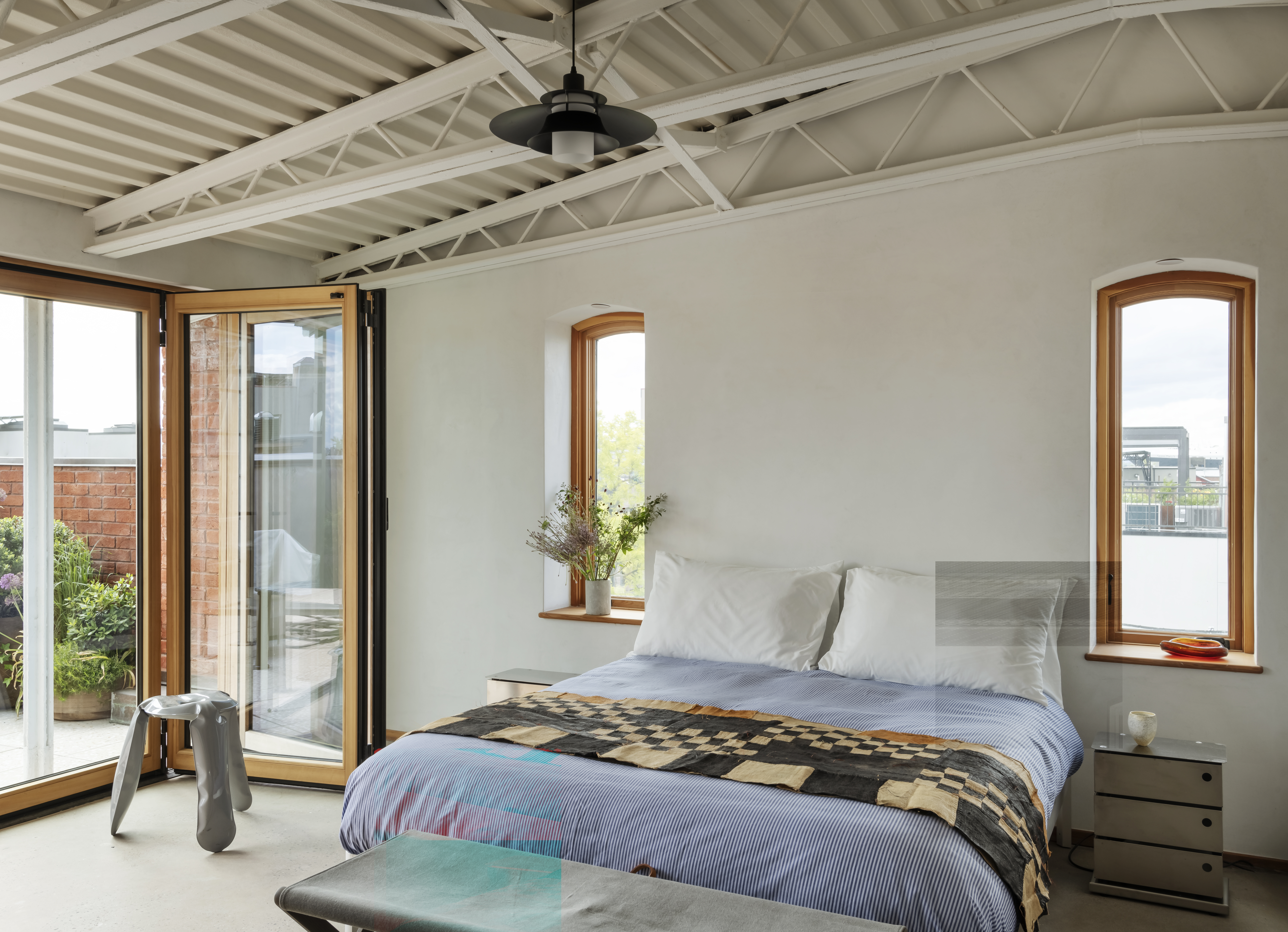 96 King Street, Unit 3 Brooklyn, NY 11231 - Photo 15 of 24 a bedroom with a bed and a balcony