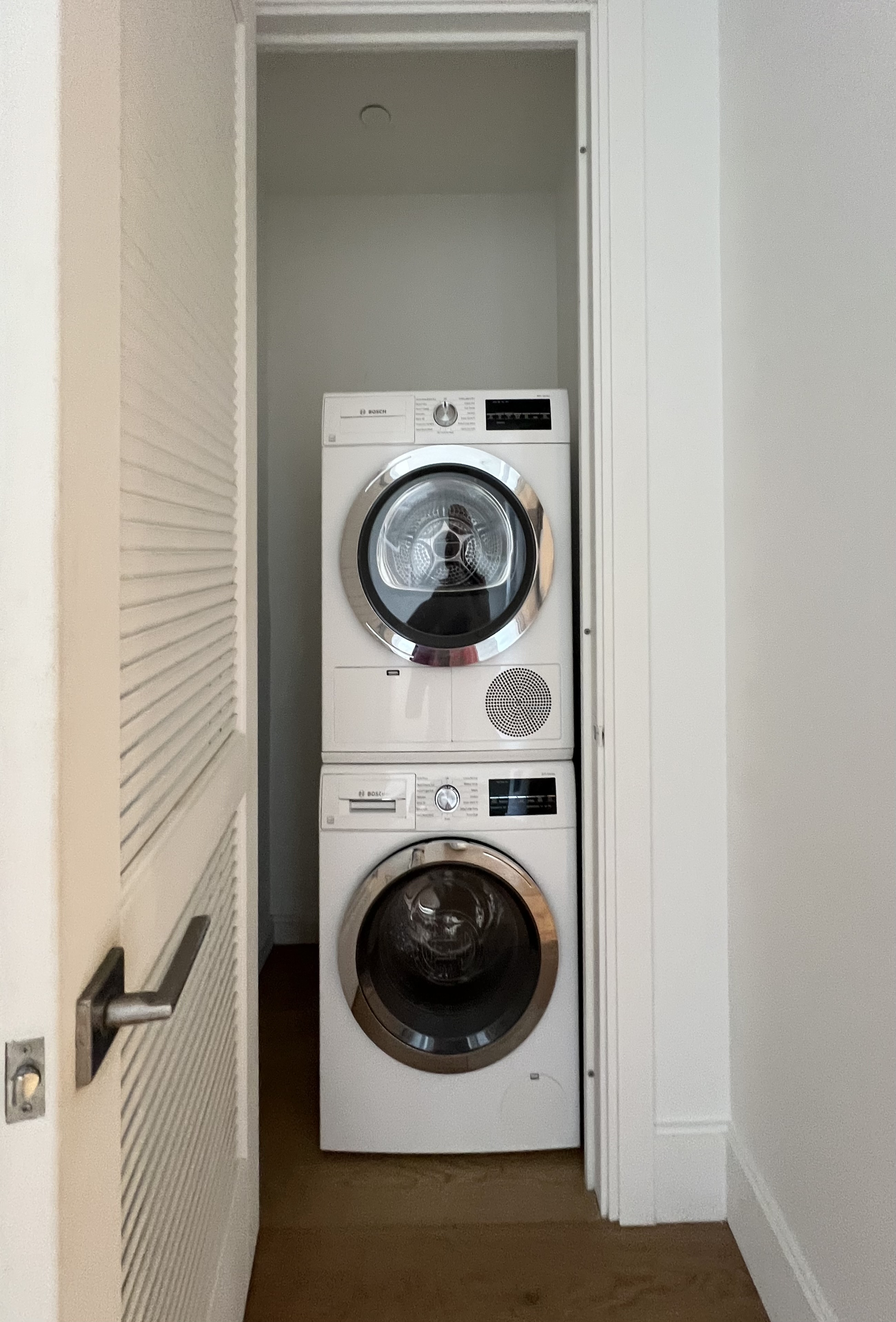 24-22 Jackson Avenue, Unit 311 Queens, NY 11101 - Photo 11 of 16 a utility room with dryer and washer