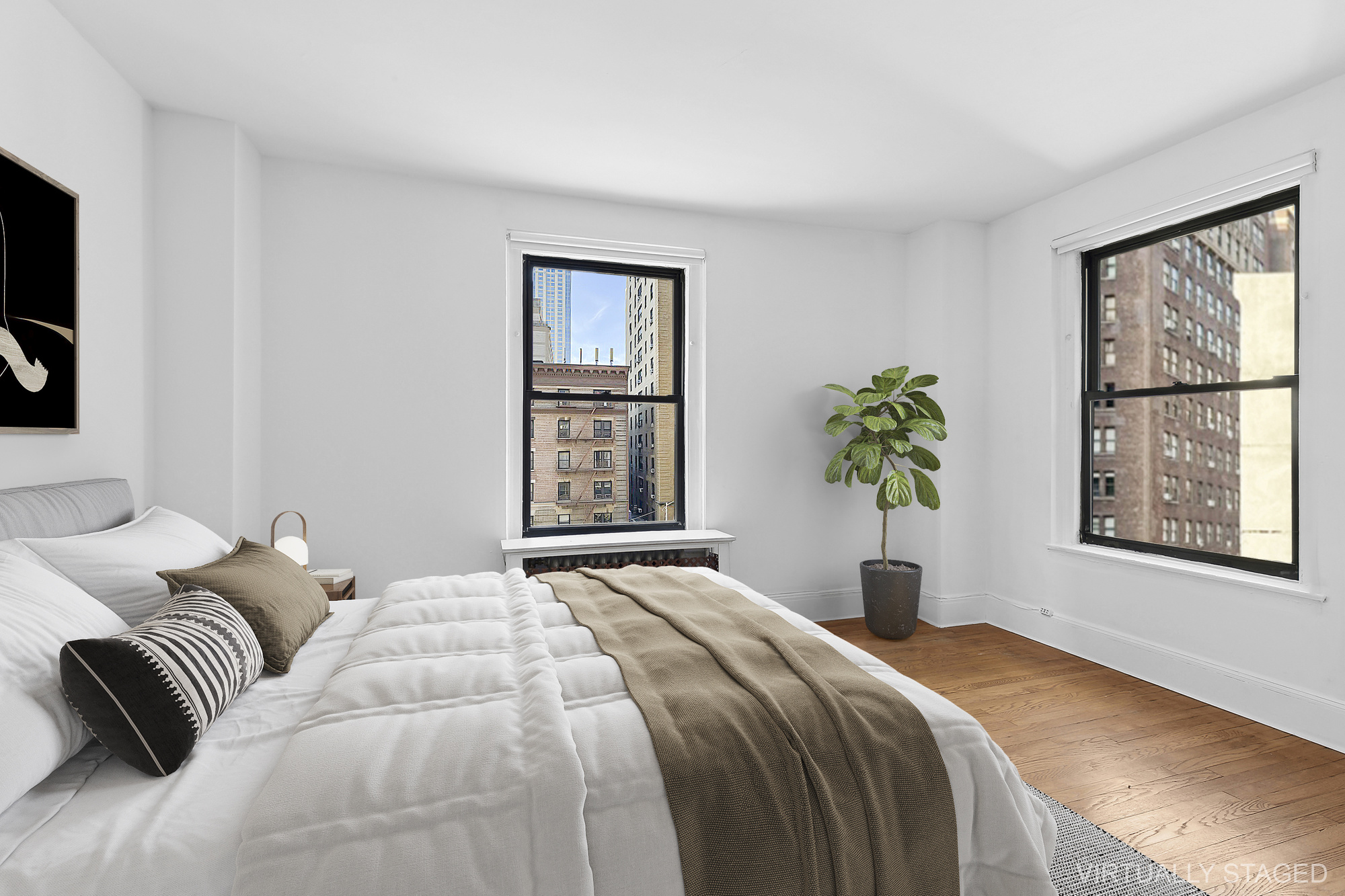 230 West End Avenue, Unit 5B Manhattan, NY 10023 - Photo 4 of 6 a bedroom with a bed and a window