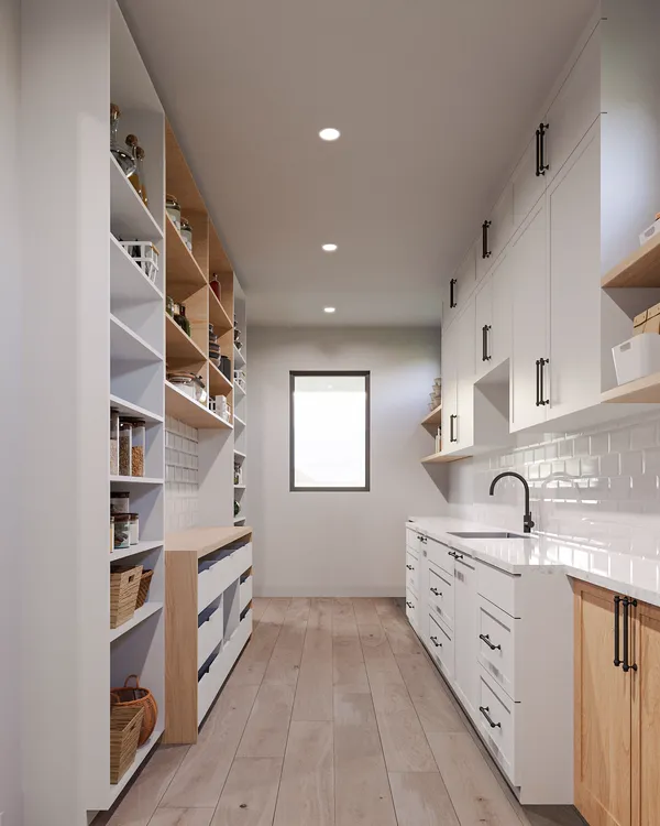 a kitchen with cabinets and window