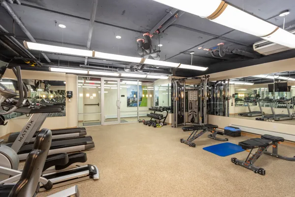 a view of a room with gym equipment