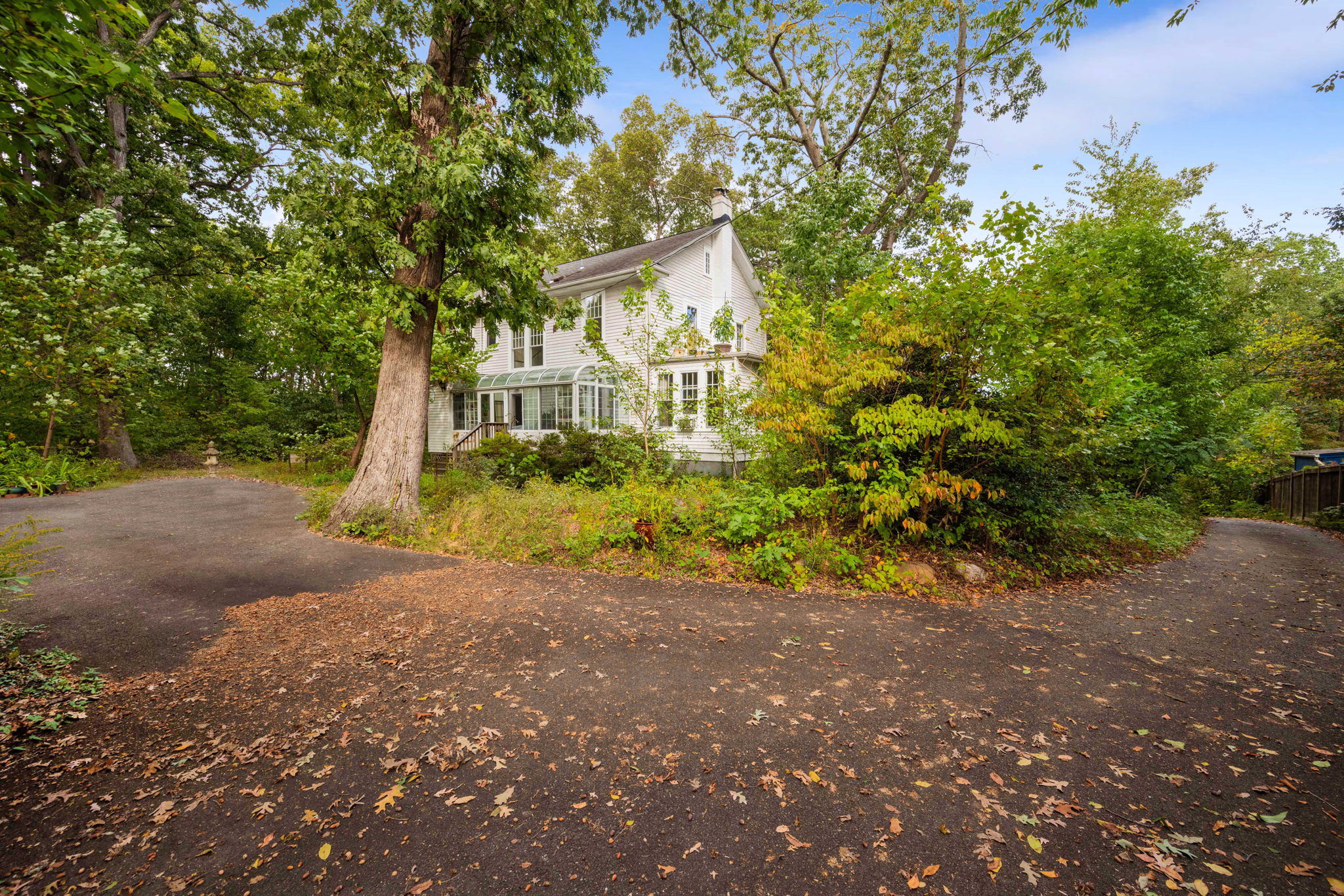 3104 Russell Road Alexandria, VA 22305 - Photo 41 of 62 a front view of a house with a yard and garage