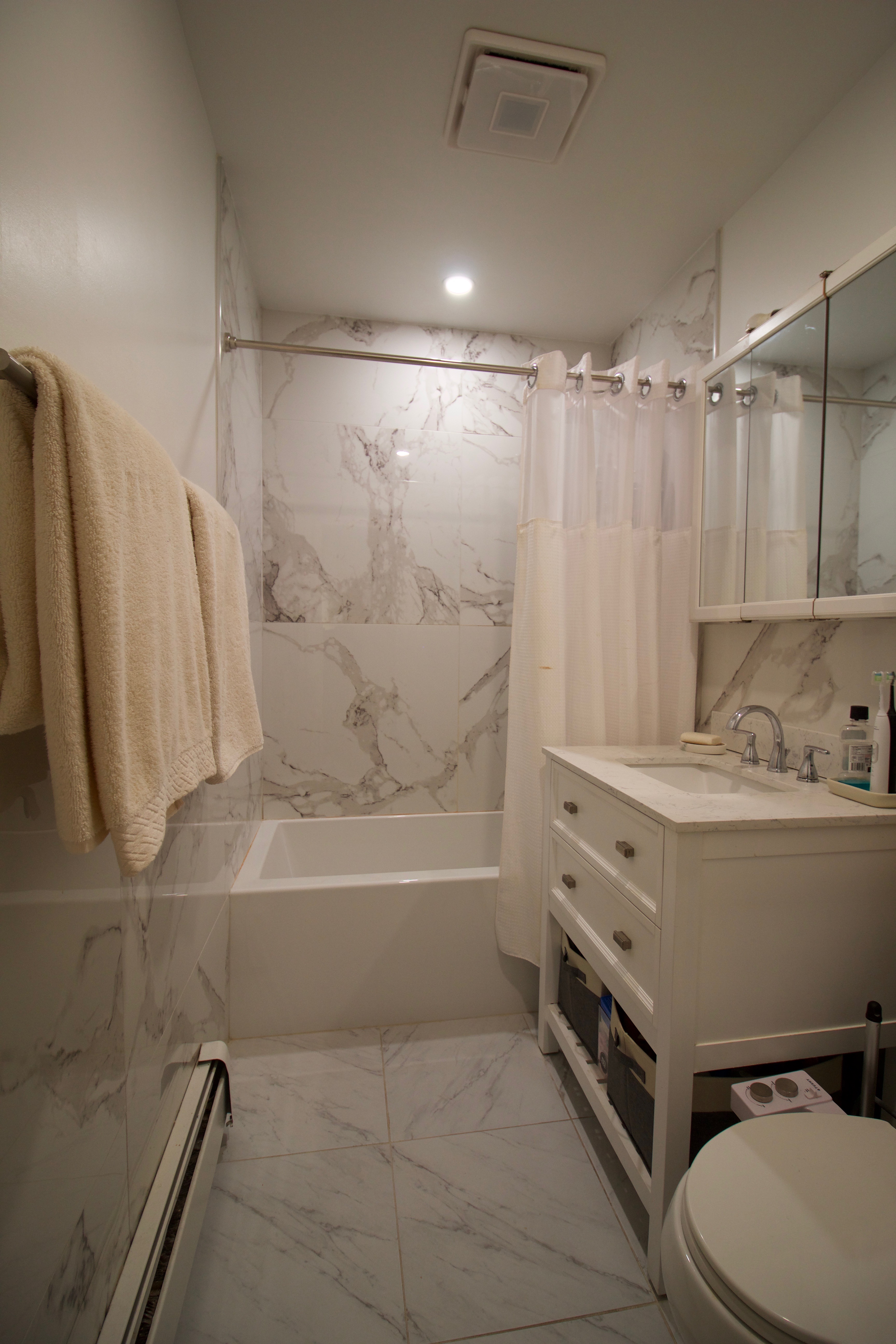 627 Baltic Street, Unit 2 Brooklyn, NY 11217 - Photo 32 of 32 a bathroom with a sink a toilet and bathtub