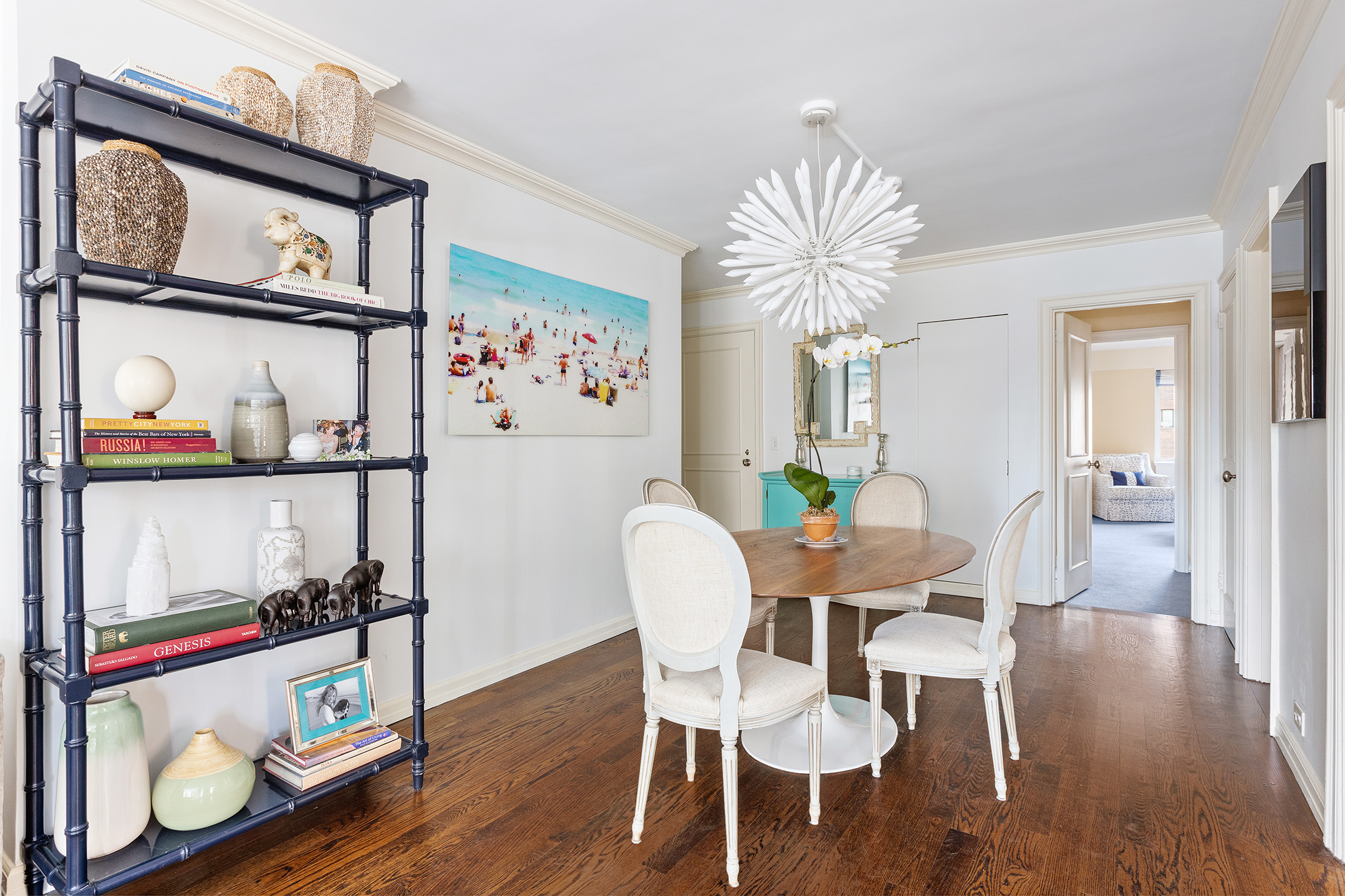 135 East 71st Street, Unit 9D Manhattan, NY 10021 - Photo 2 of 9 a dining room with furniture and wooden floor