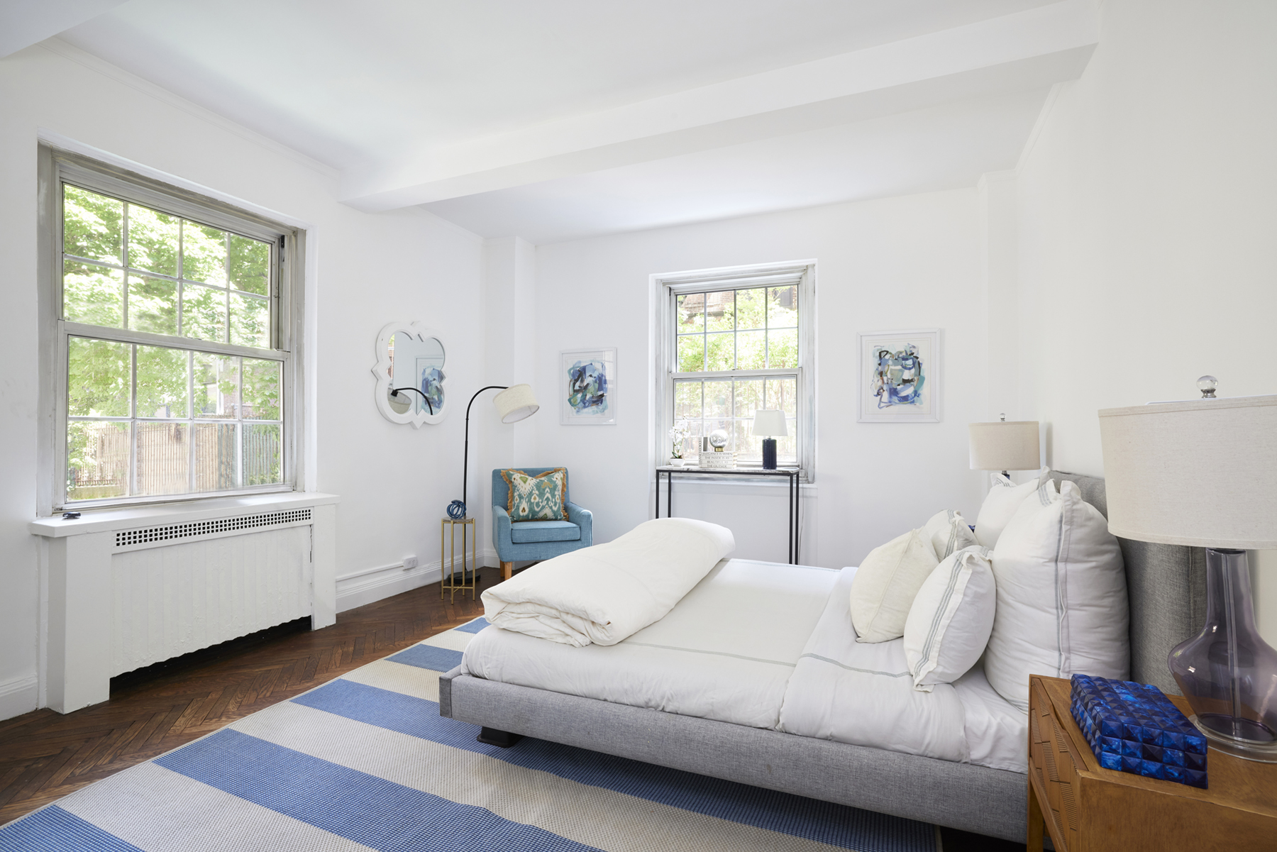 520 East 86th Street, Unit 2D Manhattan, NY 10028 - Photo 8 of 15 a living room with furniture and a window