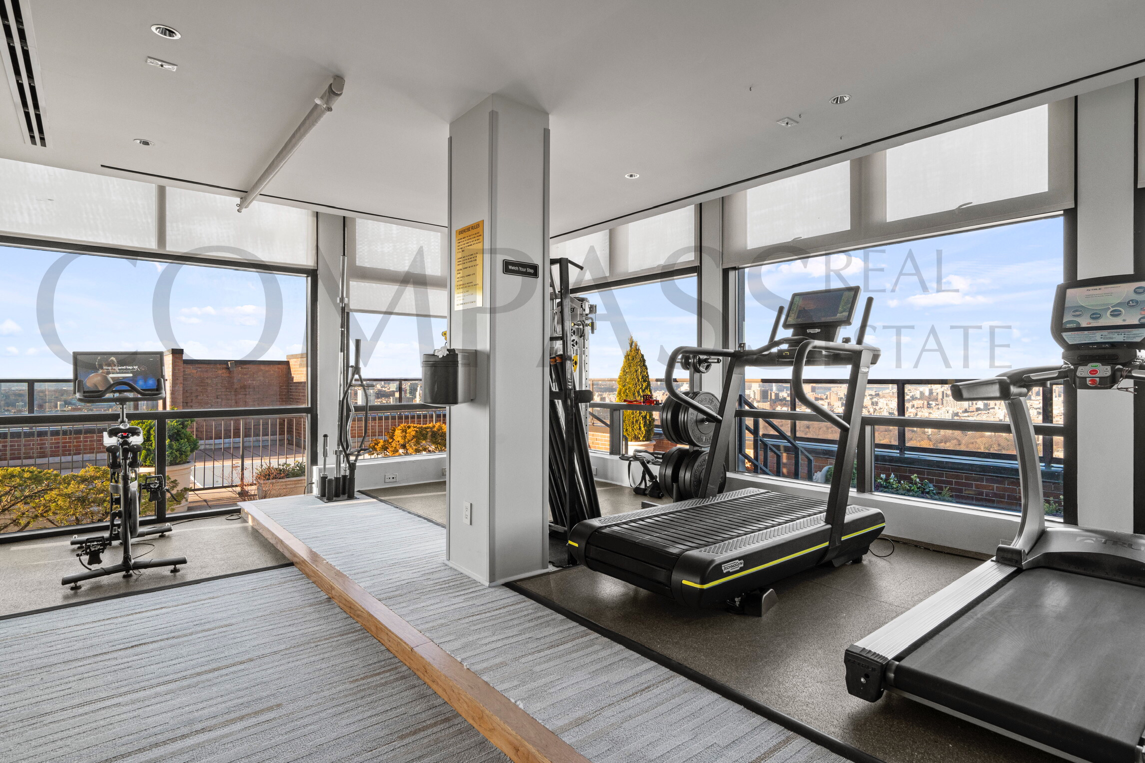 45 East 89th Street, Unit Undisclosed Manhattan, NY 10128 - Photo 9 of 10 a view of a gym with gym equipment