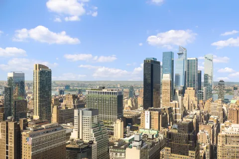 a view of a city with tall buildings