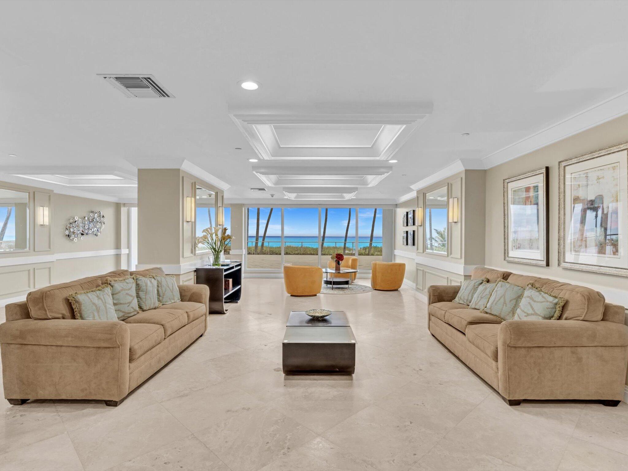 3000 South Ocean Boulevard, Unit 1504 Boca Raton, FL 33432 - Photo 49 of 64 a living room with furniture and a large window