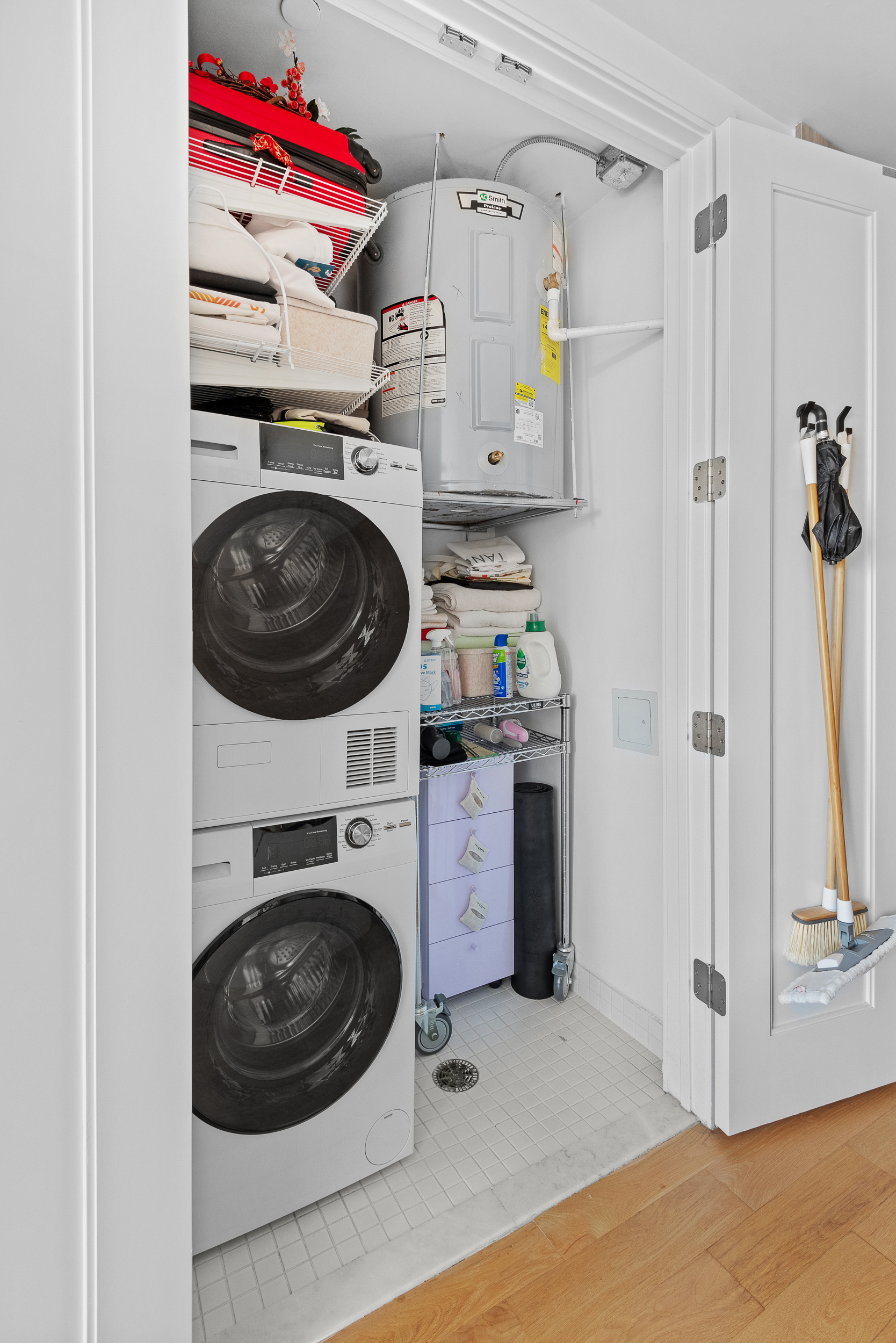 183 Mc Guinness Boulevard, Unit 6C Brooklyn, NY 11222 - Photo 9 of 12 a utility room with dryer and washer