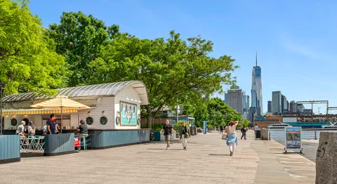 a view of a terrace with sitting area