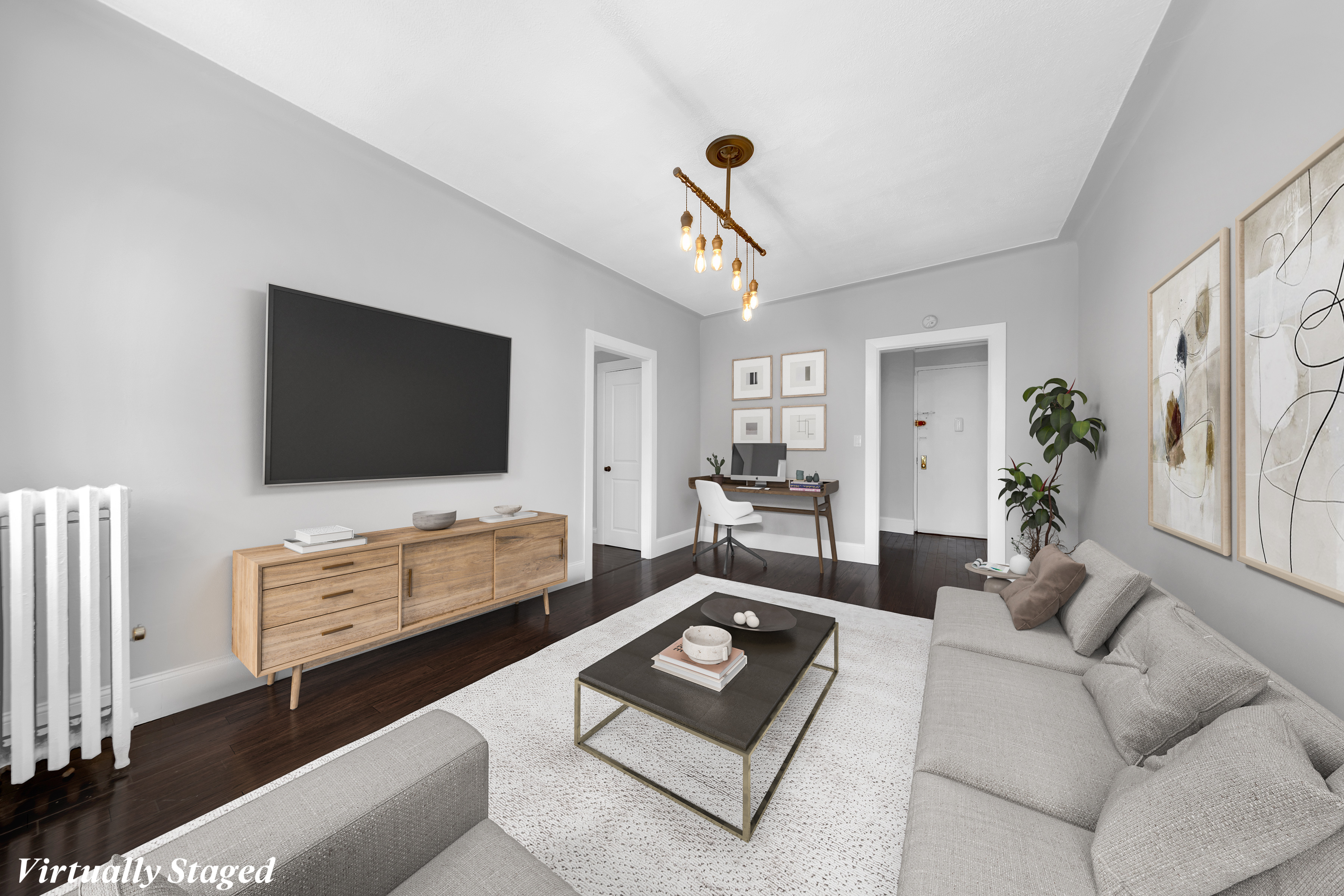 37-20 83rd Street, Unit 6J Queens, NY 11372 - Photo 3 of 14 a living room with furniture and a flat screen tv