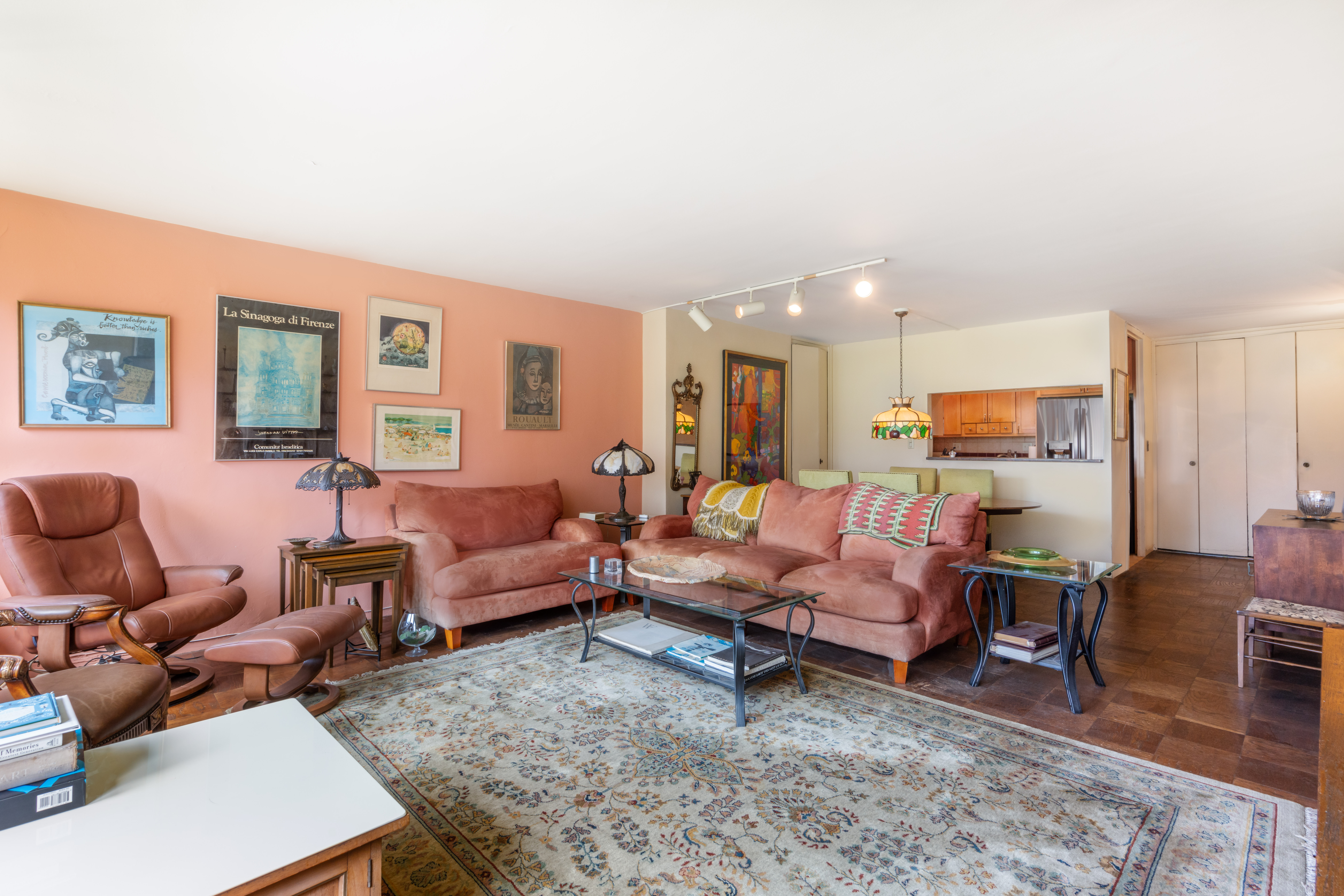 330 East 33rd Street, Unit 7C Manhattan, NY 10016 - Photo 2 of 18 a living room with furniture and wooden floor