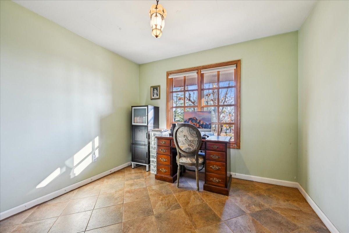 Johnston Drive Watchung, NJ 07069 - Photo 37 of 85 a view of a workspace with furniture and a window