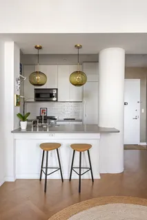 a utility room with sink dryer and washer