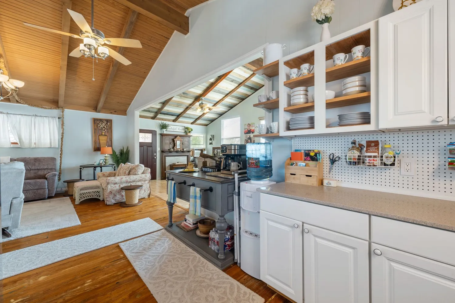a kitchen with sink and cabinets