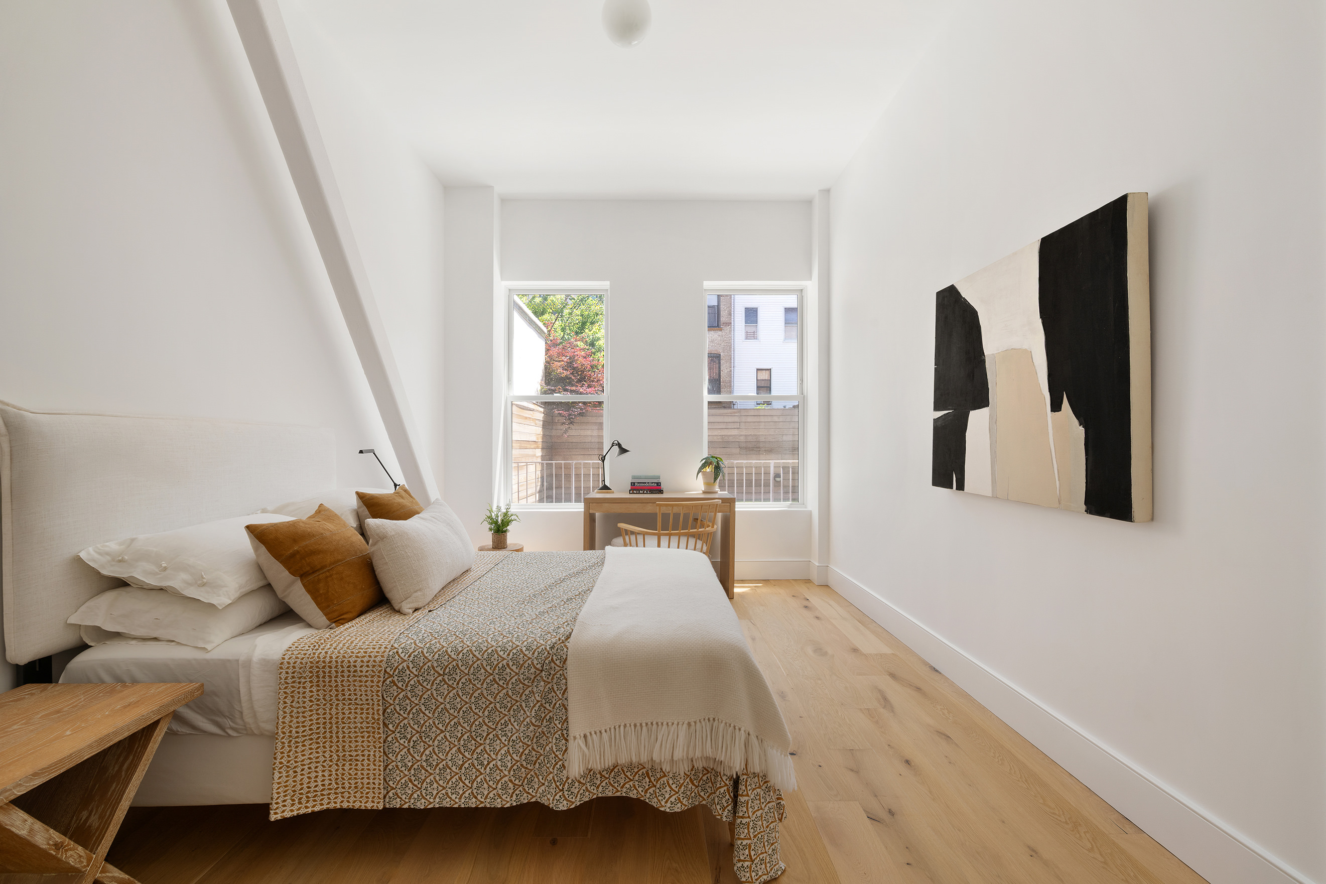524 Halsey Street, Unit 109 Brooklyn, NY 11233 - Photo 4 of 10 a bedroom with bed and window