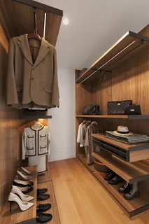 a blue chair sitting inside of a room