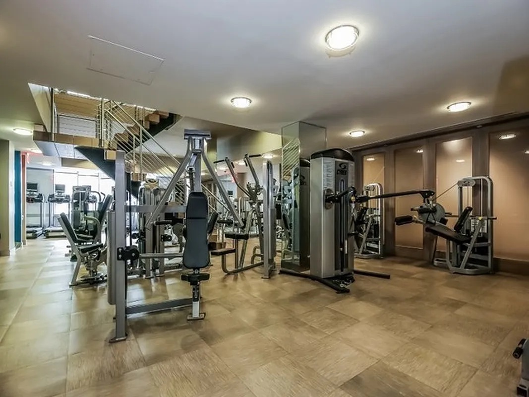 225 Rector Place, Unit 19C Manhattan, NY 10280 - Photo 10 of 11 a view of a room with gym equipment