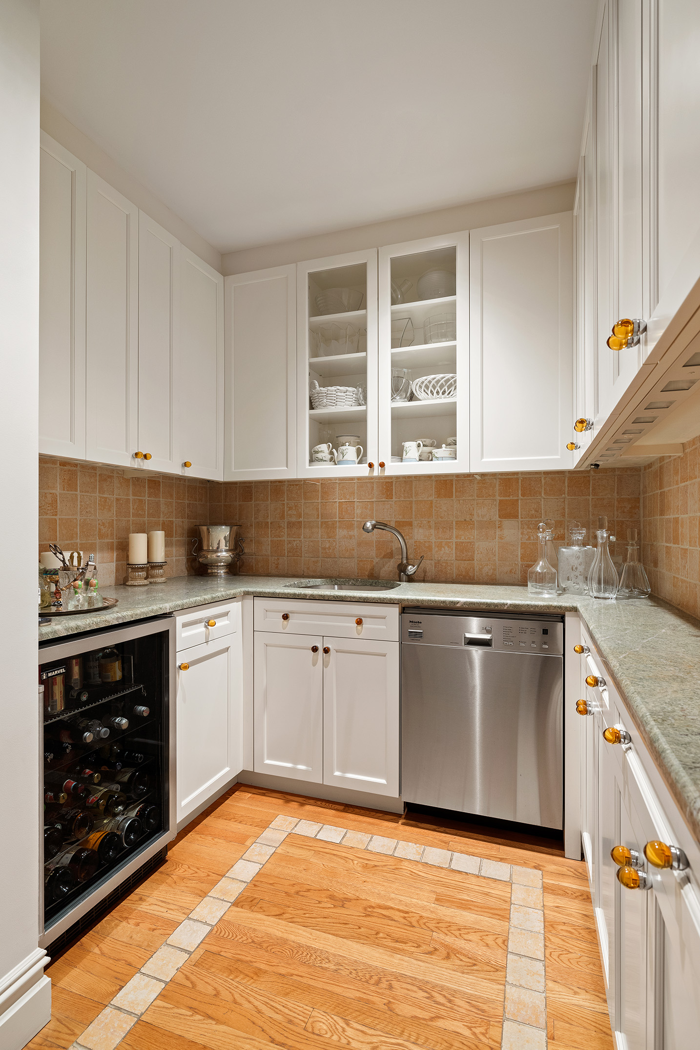 151 West 86th Street, Unit 4D Manhattan, NY 10024 - Photo 7 of 15 a kitchen with granite countertop a sink stainless steel appliances and cabinets