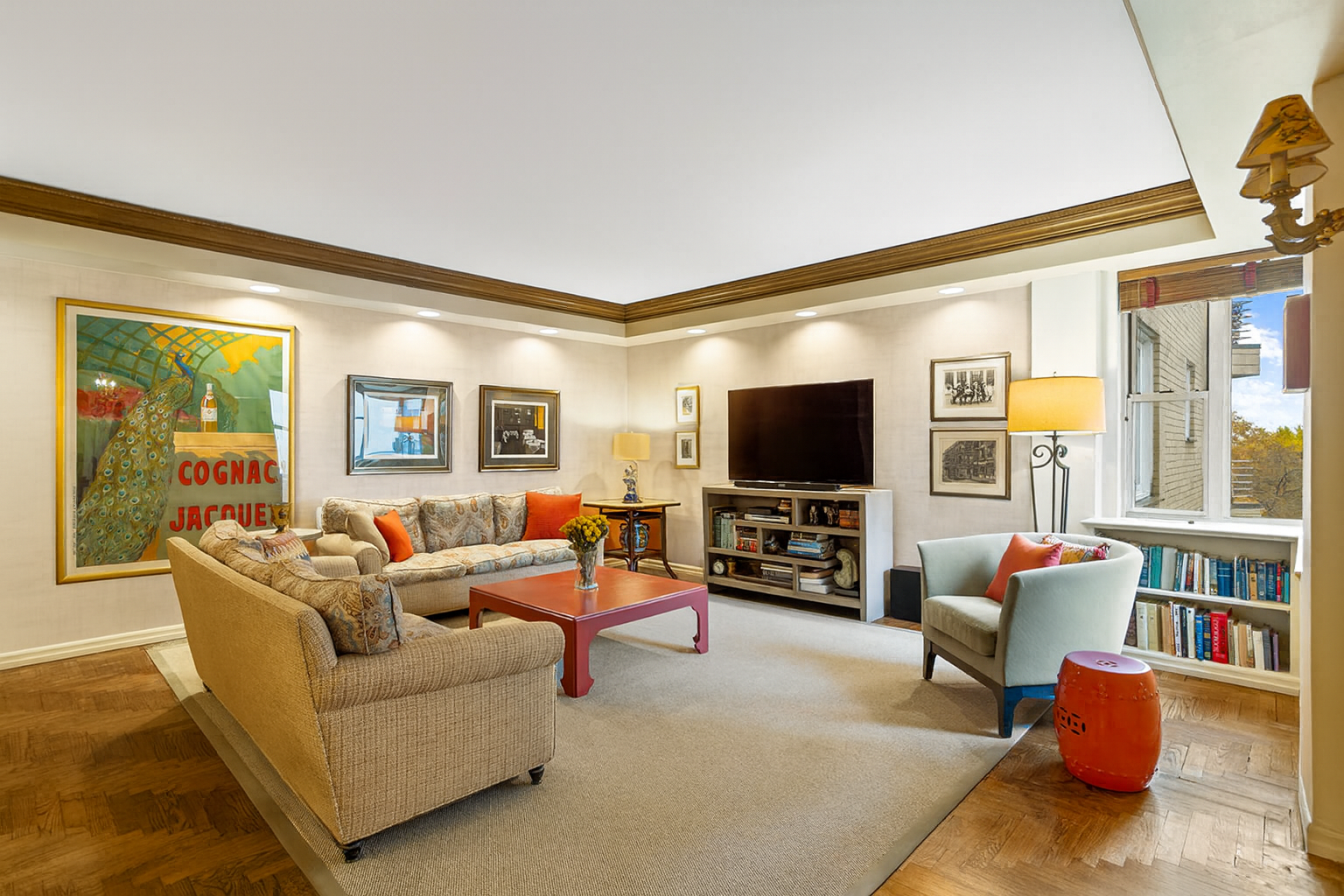 200 East End Avenue, Unit 10KL Manhattan, NY 10128 - Photo 5 of 23 a living room with furniture and a flat screen tv