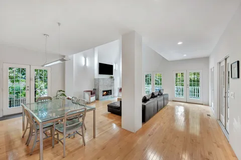a living room with fireplace furniture and a fireplace