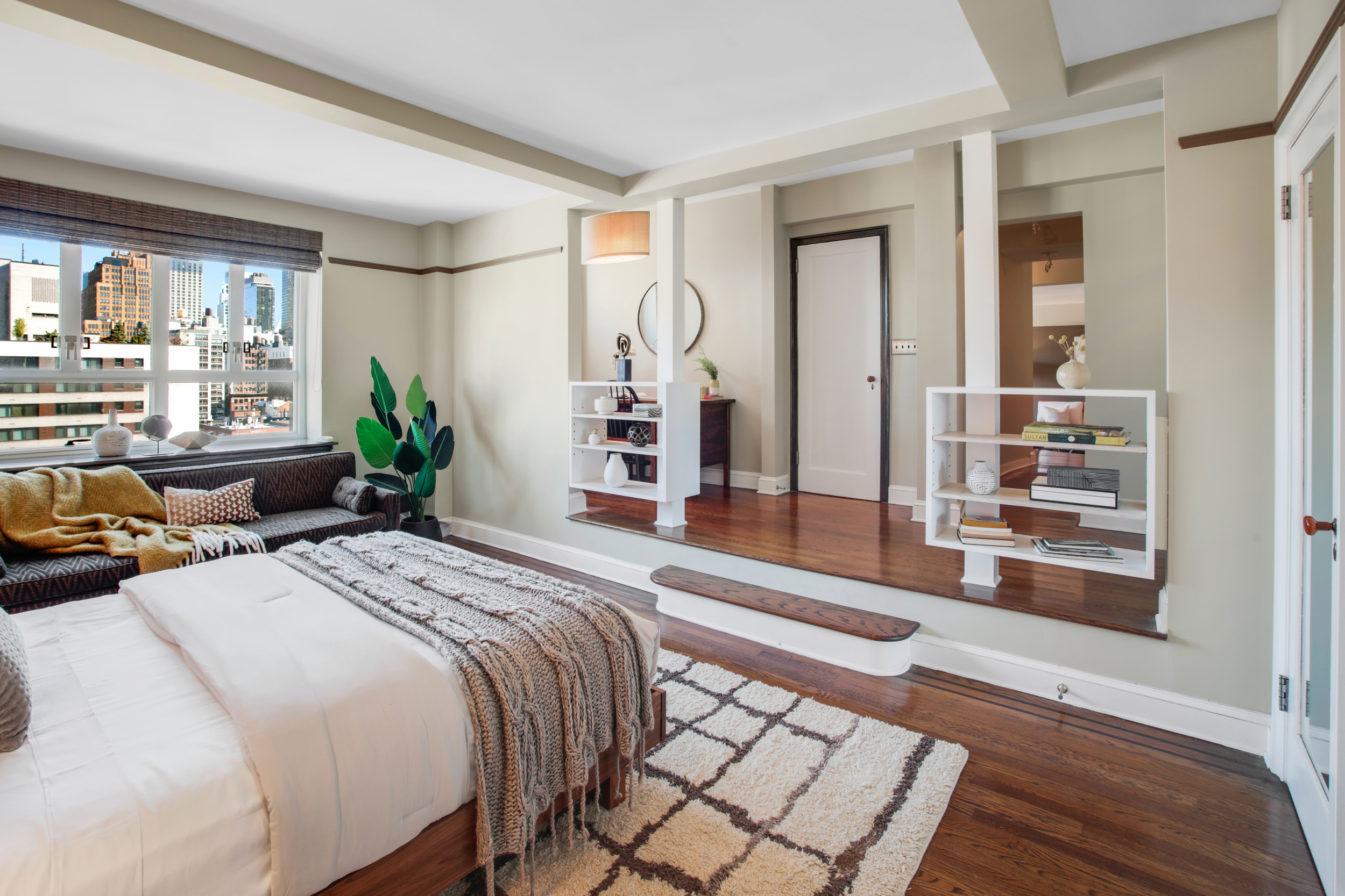 200 West 20th Street, Unit 1409/10 Manhattan, NY 10011 - Photo 6 of 15 a spacious bedroom with two beds and a large window