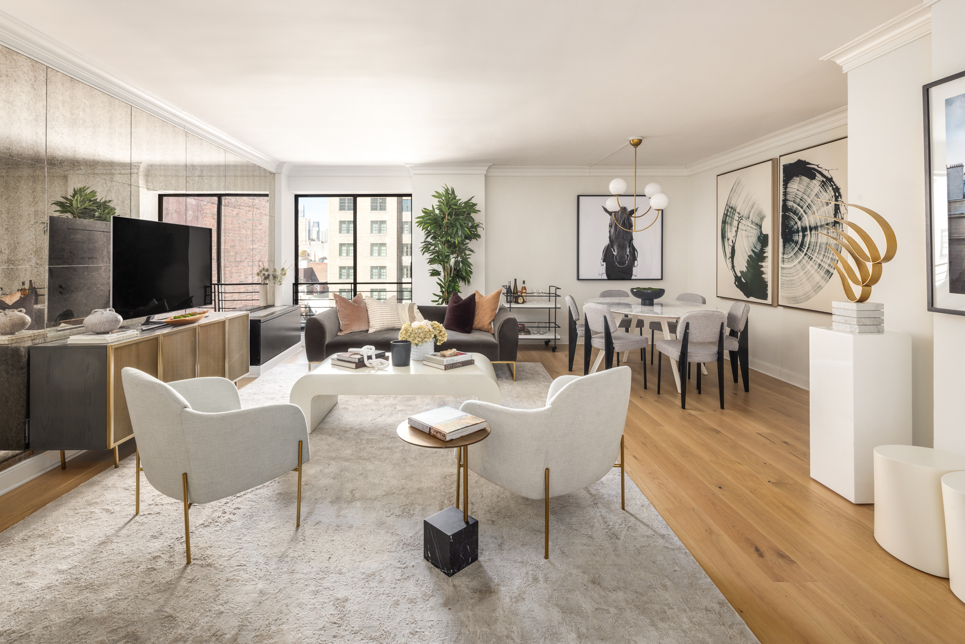 32 East 76th Street, Unit 805 Manhattan, NY 10021 - Photo 14 of 15 a living room with fireplace furniture and a flat screen tv