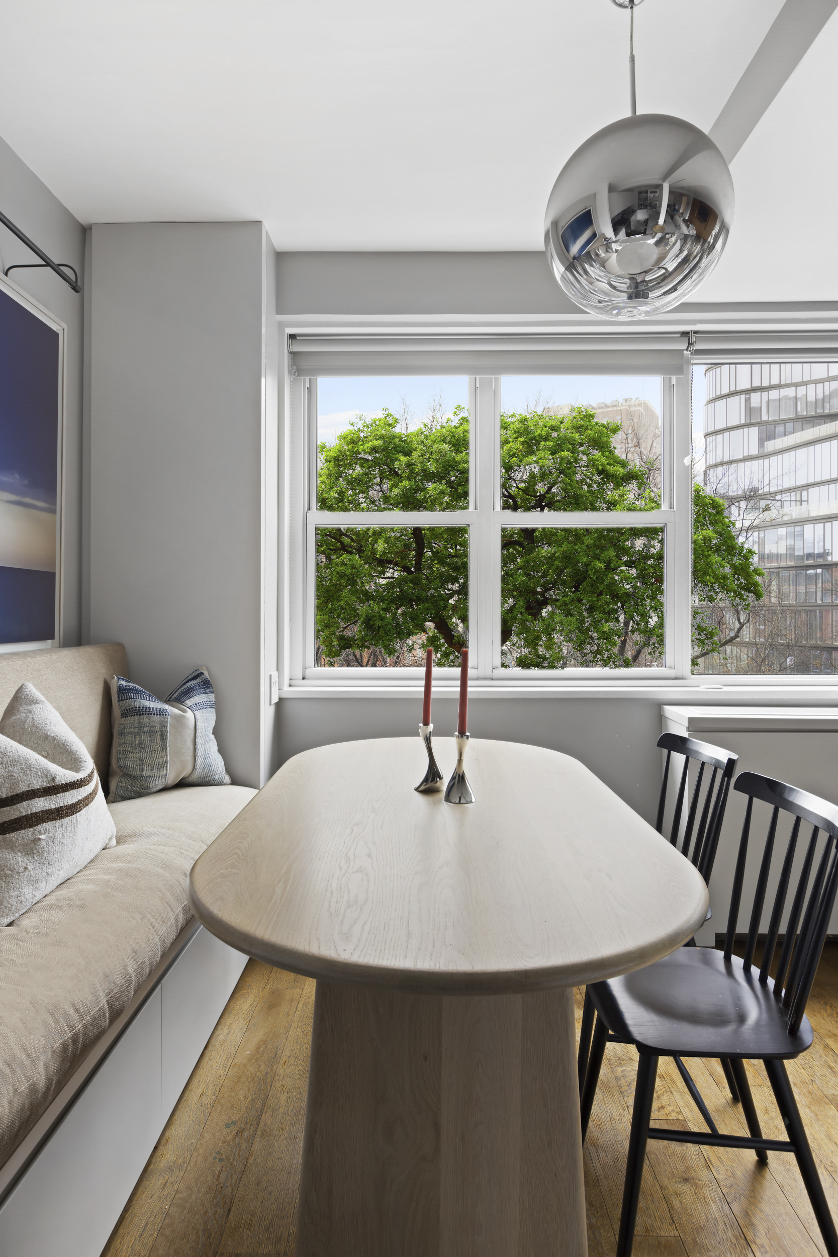 2 Horatio Street, Unit 4JS Manhattan, NY 10014 - Photo 3 of 20 a living room with furniture and a table